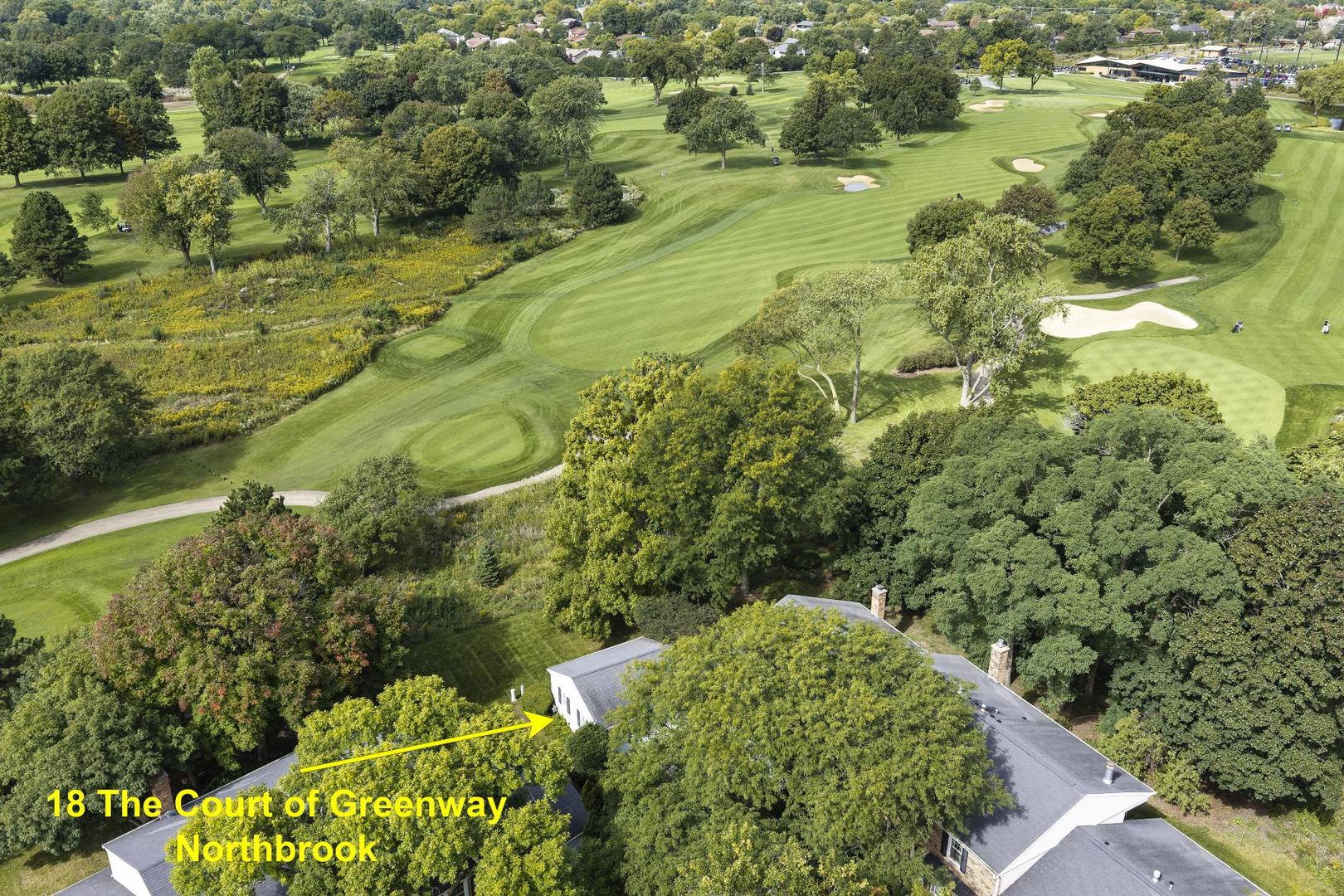 Aerial view of 18 The Court of Greenway beside a golf course in Northbrook.