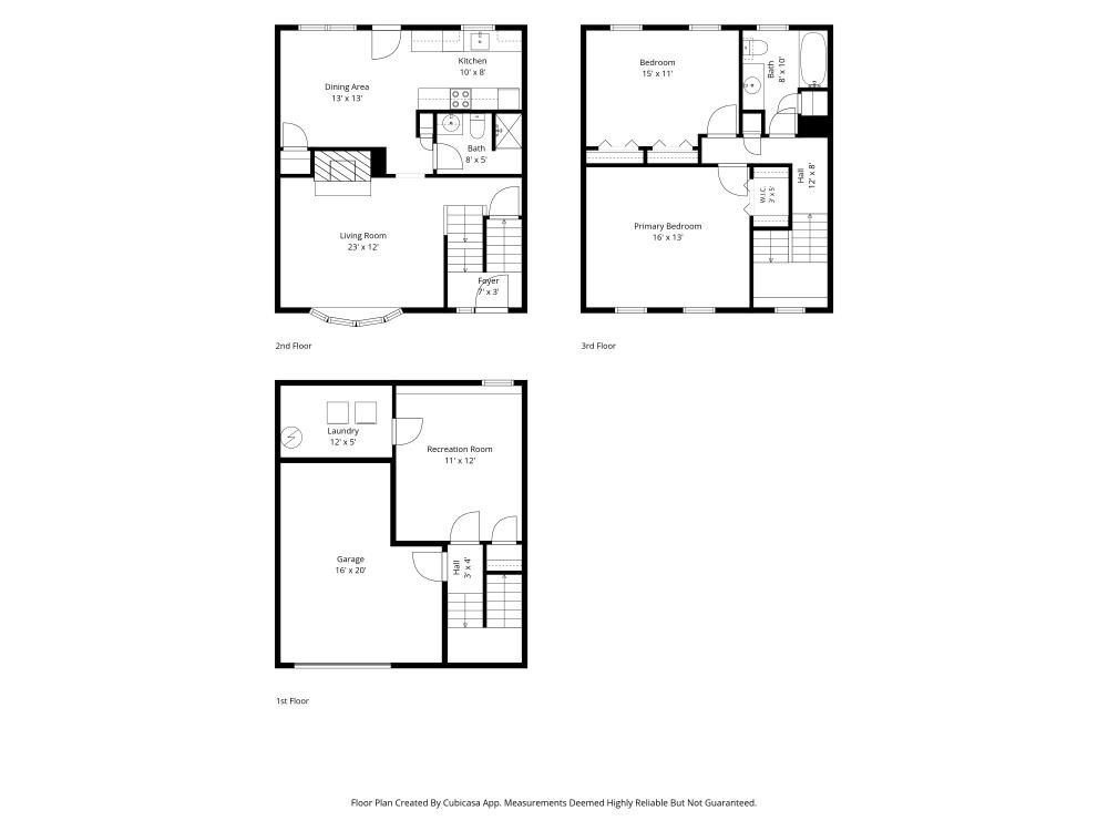 Three-level floor plan with garage, recreation room, living areas, two bedrooms, and bathrooms.