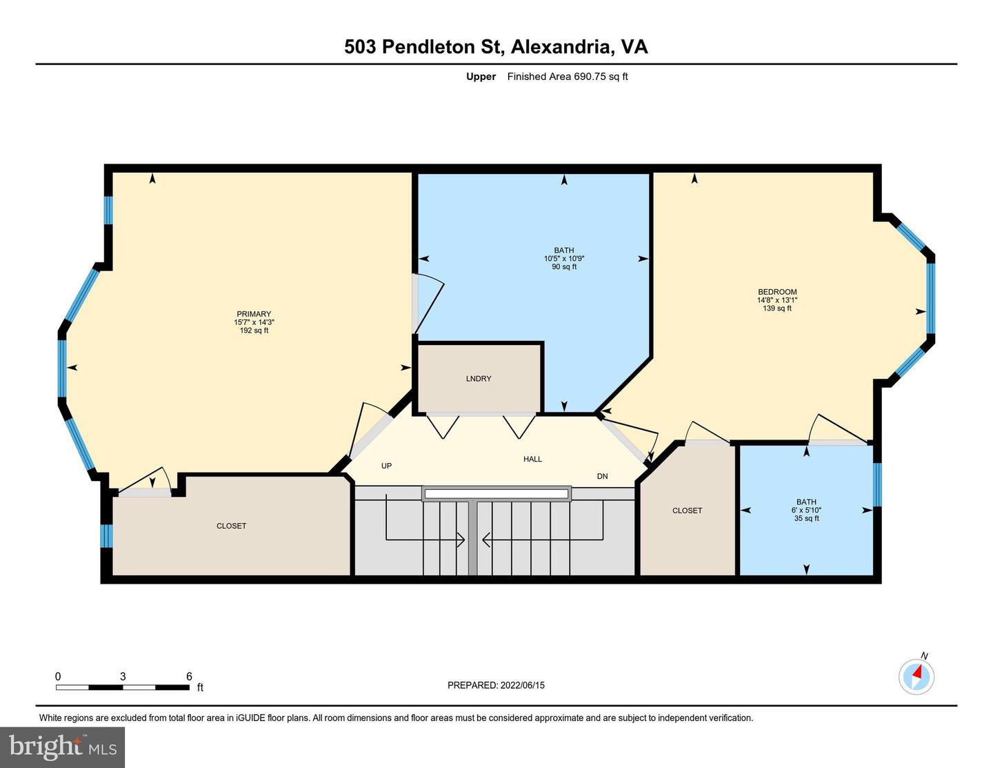 Upper-level floor plan showing two bedrooms, two bathrooms, laundry, closets, and stairs.