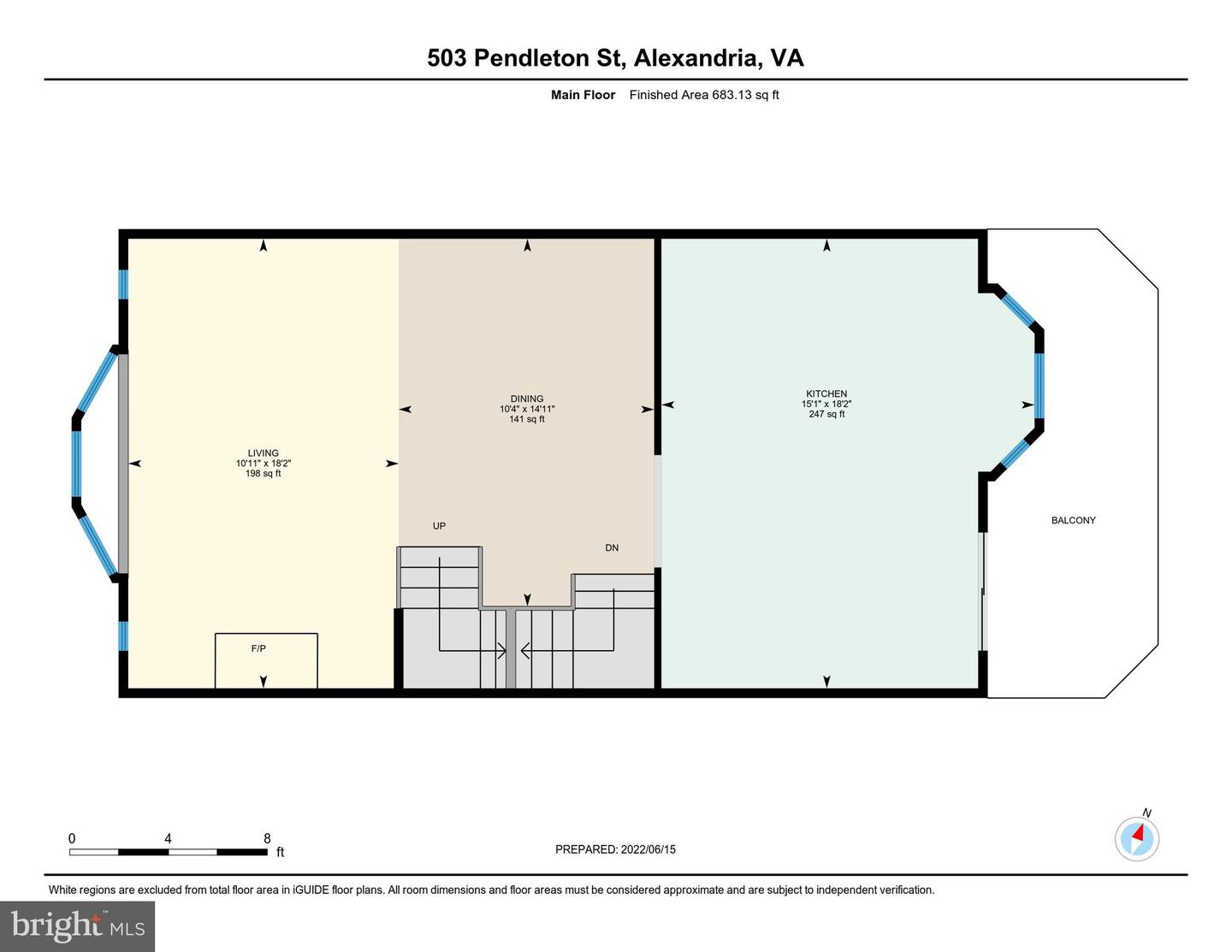 Main-floor plan showing living, dining, and kitchen areas, stairs, a fireplace, and a balcony.
