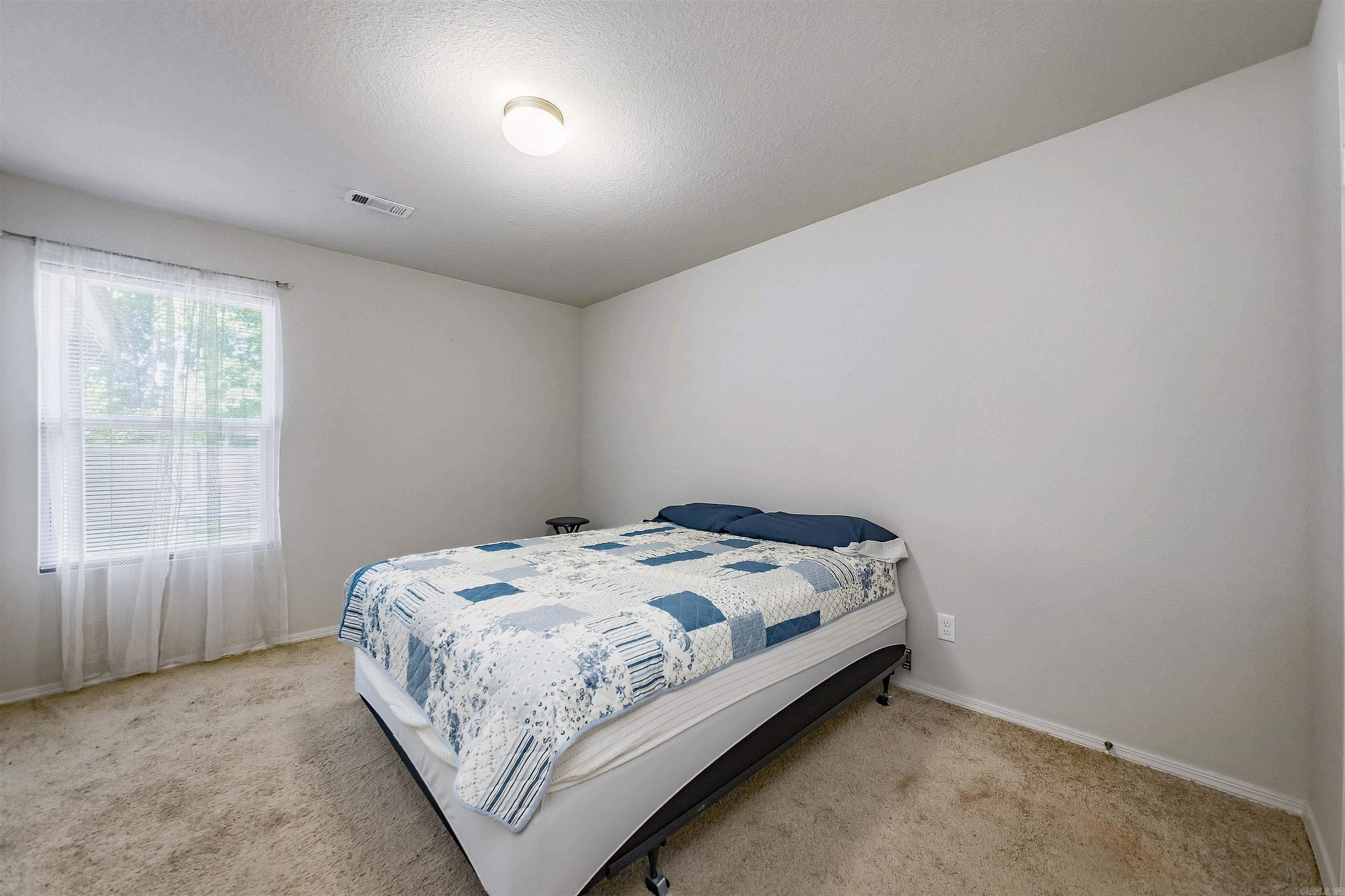 7130 Woodsgate Cove
