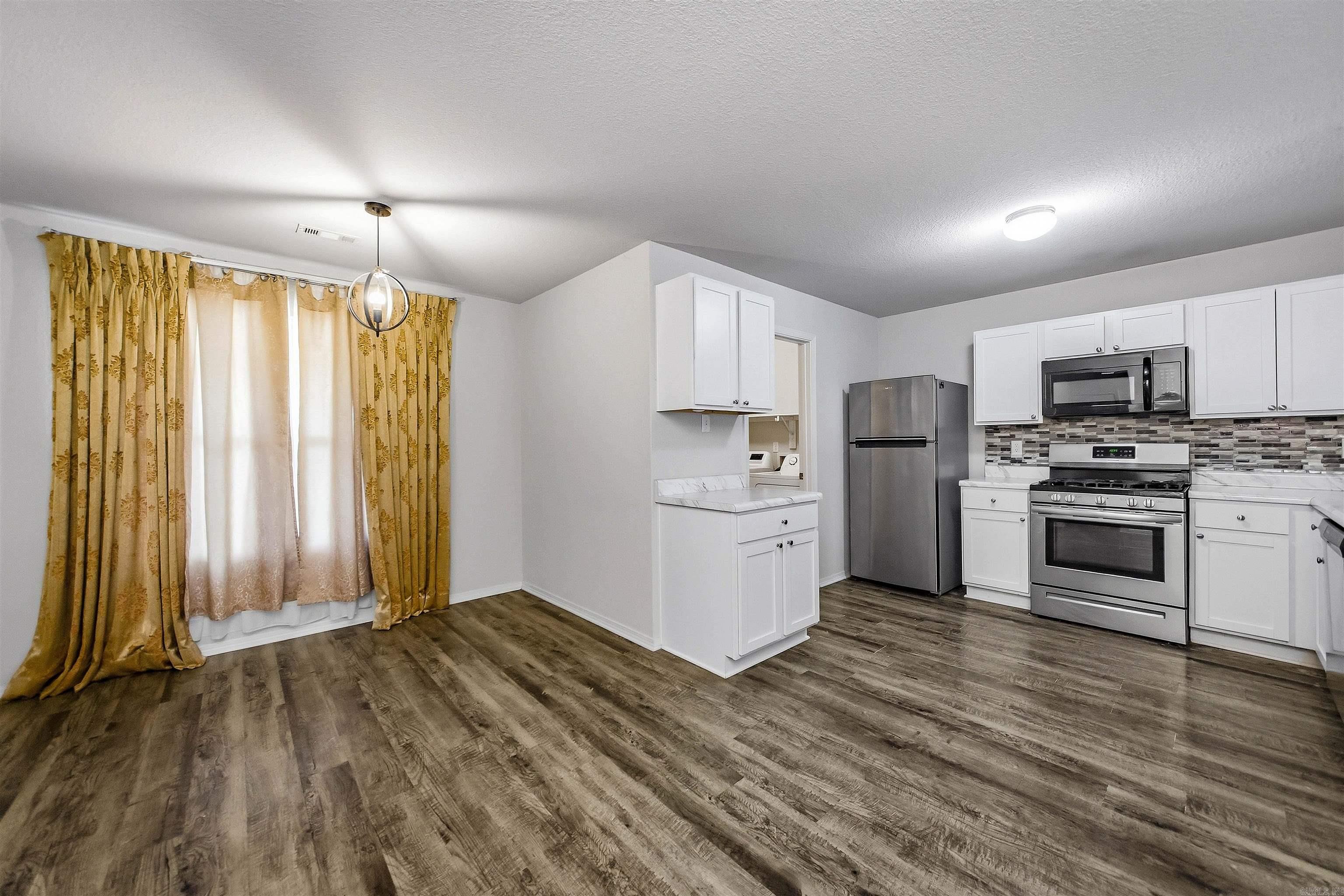 7130 Woodsgate Cove