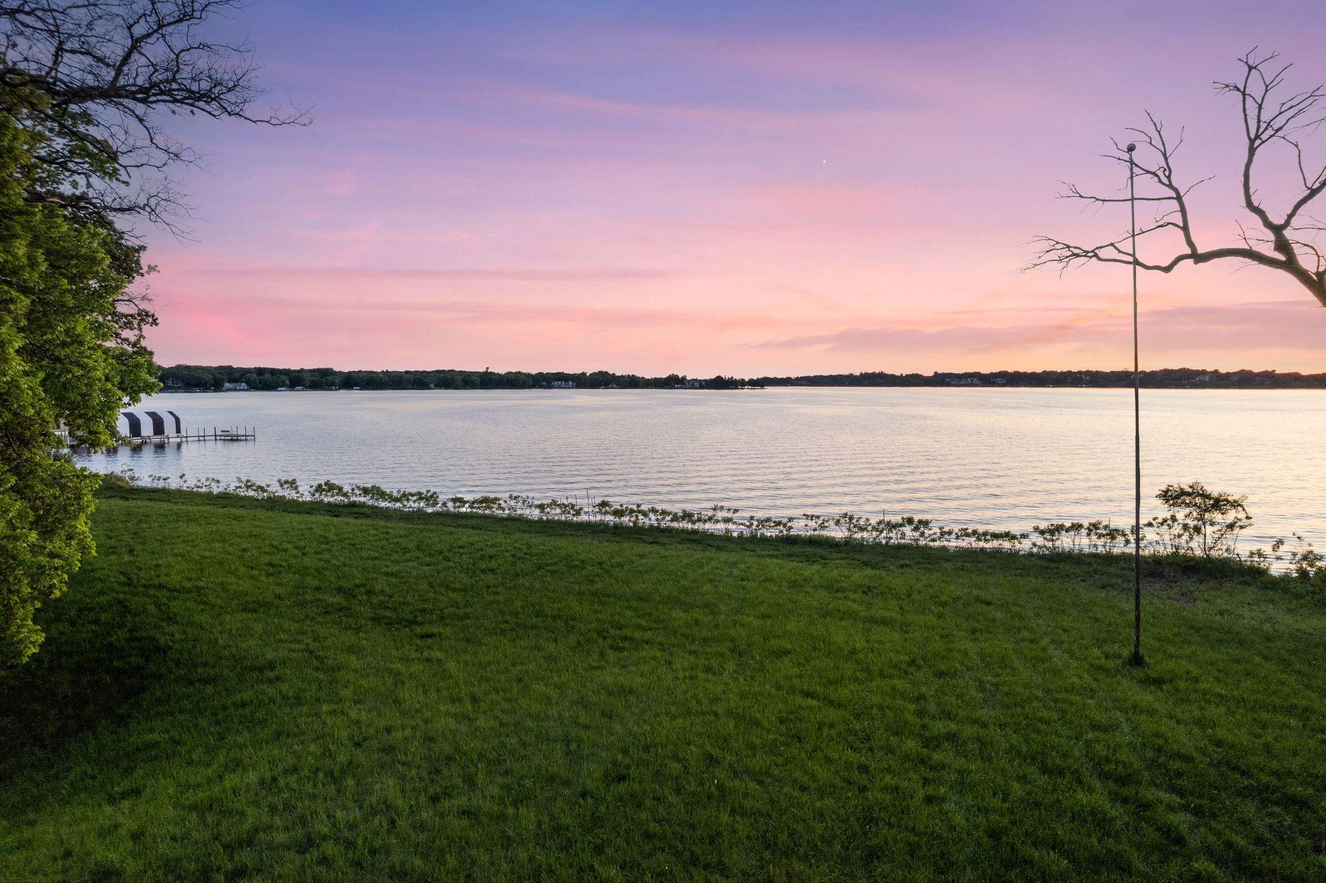 Lake Minnetonka luxury estate site at 535 Bushaway Road Wayzata MN with west-facing shoreline
