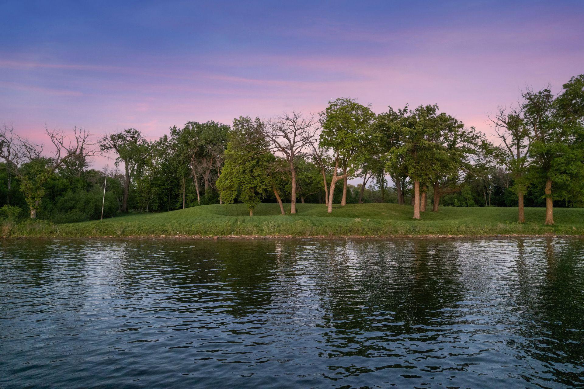 Lake Minnetonka luxury estate site at 535 Bushaway Road Wayzata MN with west-facing shoreline