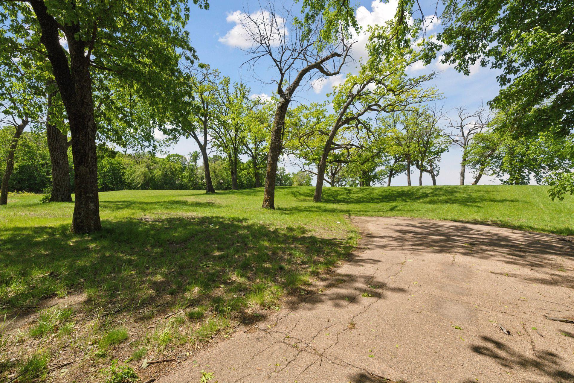 Lake Minnetonka luxury estate site at 555 Bushaway Road Wayzata MN with west-facing shoreline