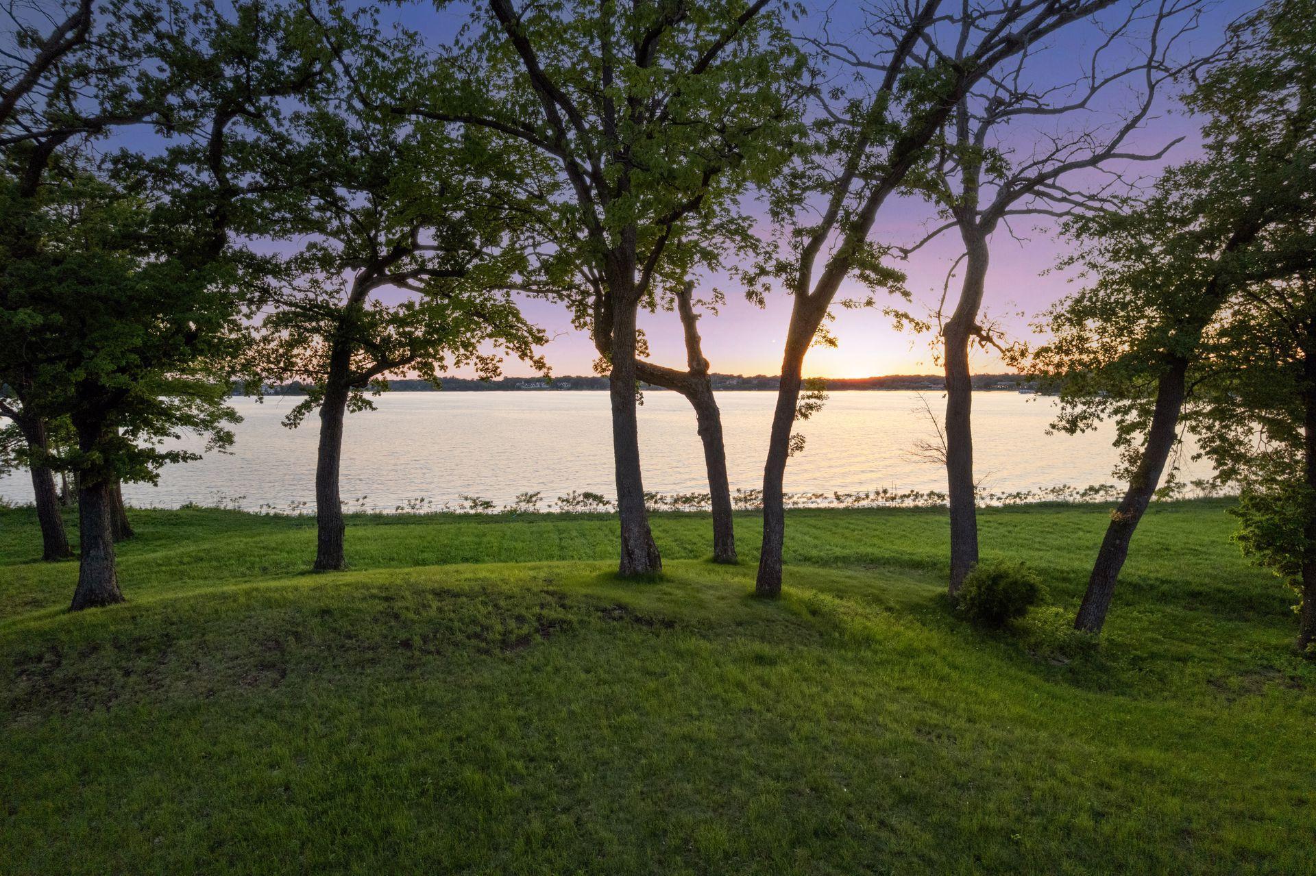 Lake Minnetonka luxury estate site at 555 Bushaway Road Wayzata MN with west-facing shoreline