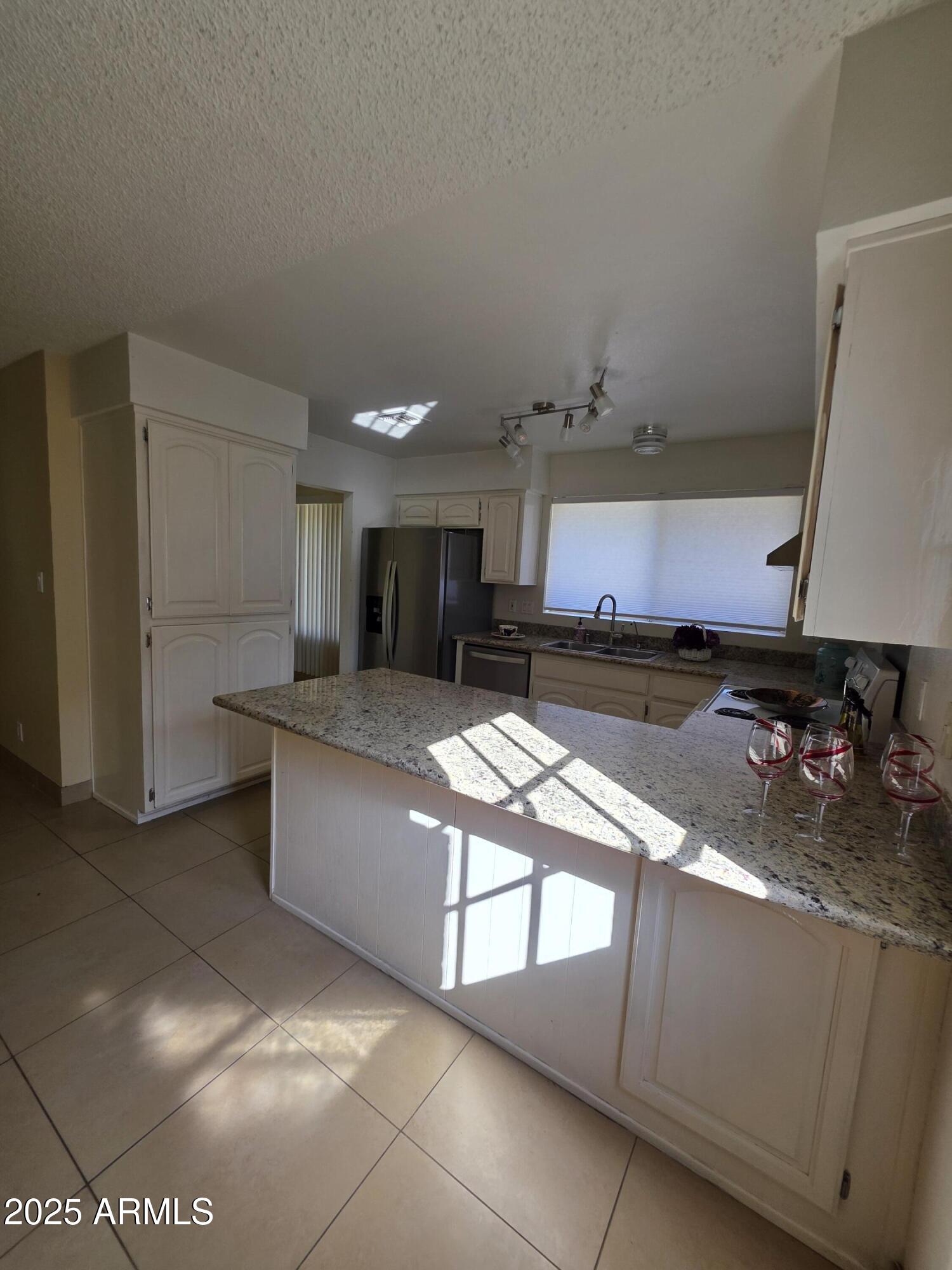 10470 E CLINTON Street