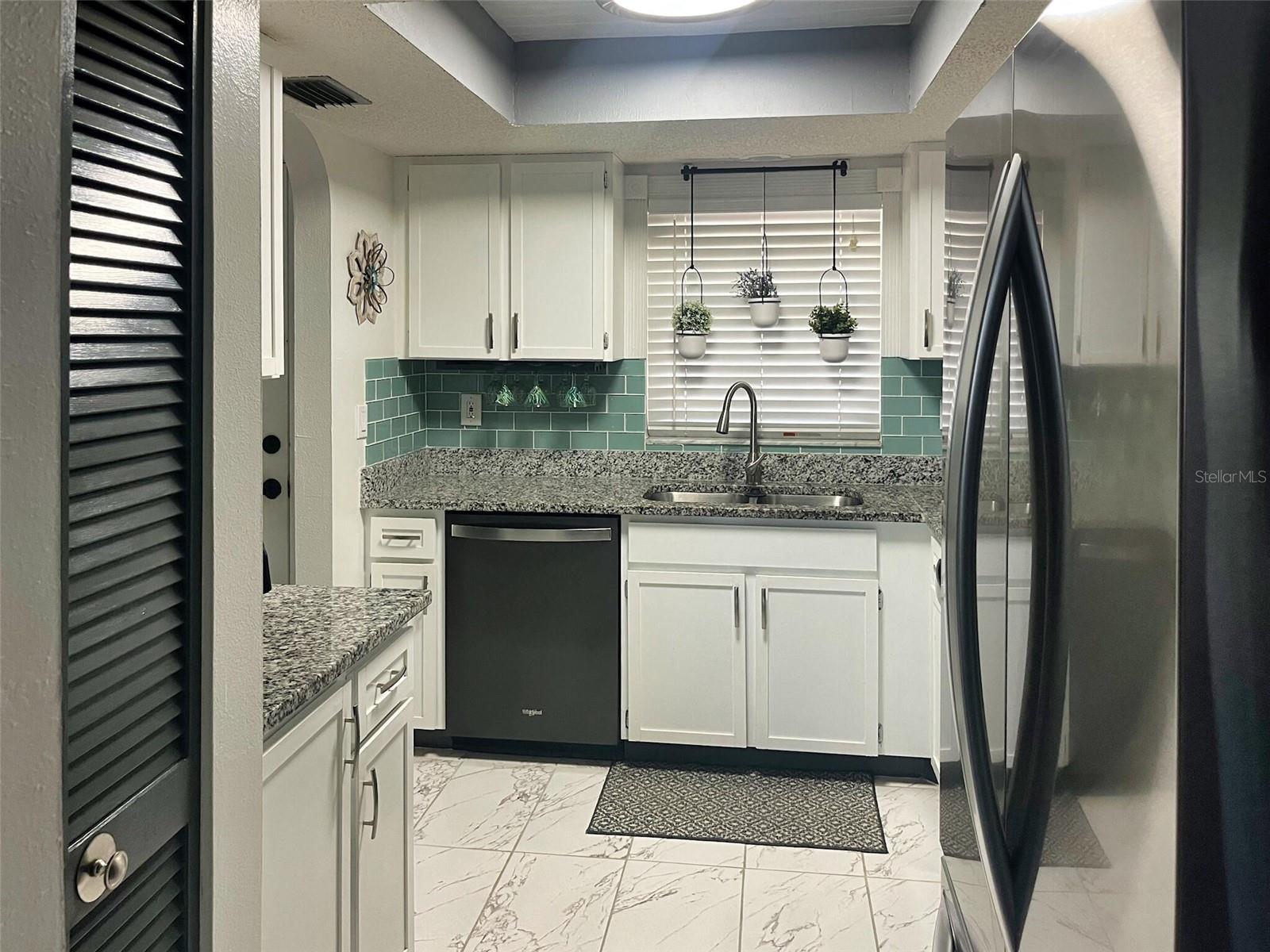 2395 HARBOR BLVD #203