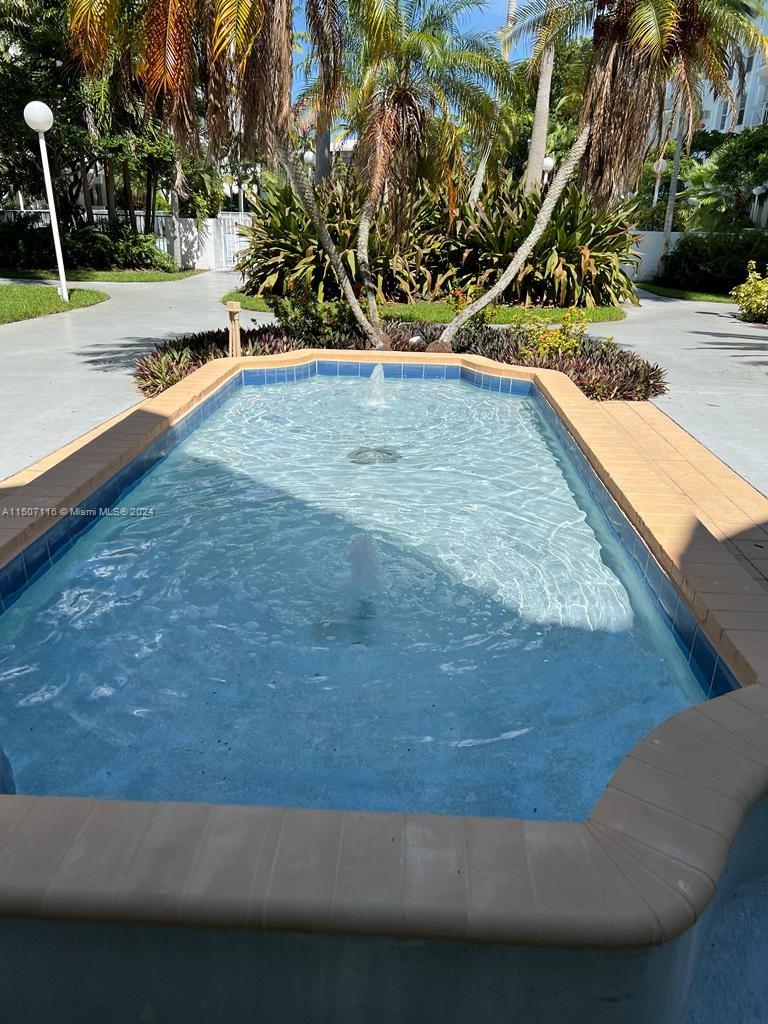 498 NW 165th St Rd Unit: D-407