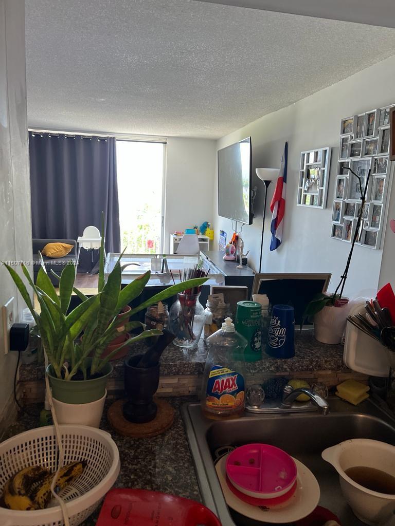 498 NW 165th St Rd Unit: D-407