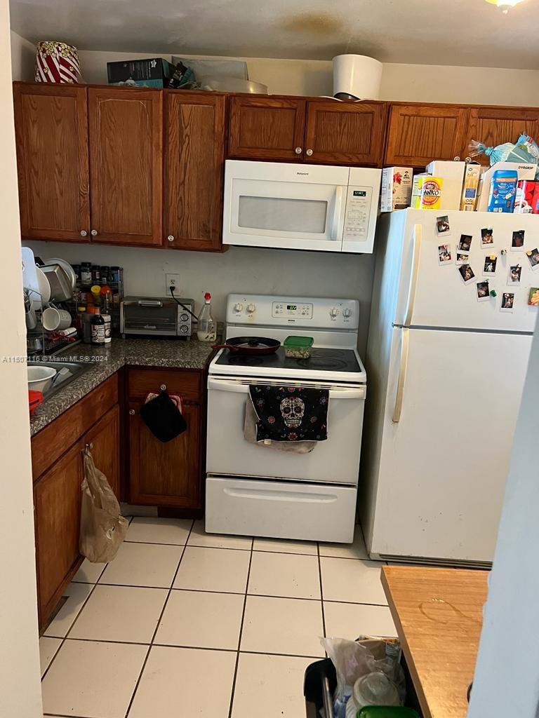 498 NW 165th St Rd Unit: D-407