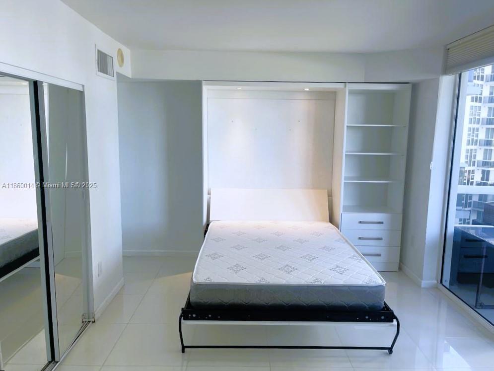 10275 Collins Ave # 606