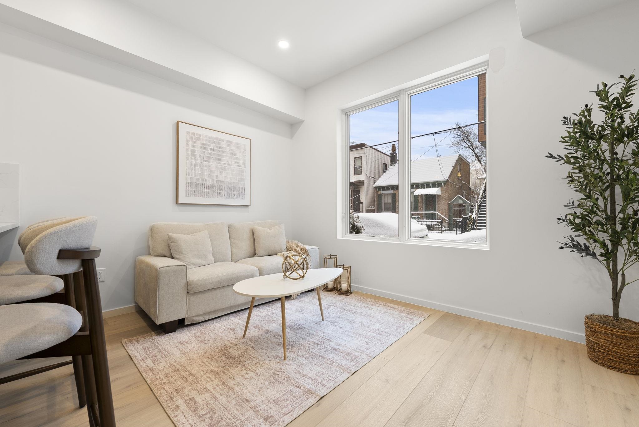 63 WEBSTER AVE Unit: 1