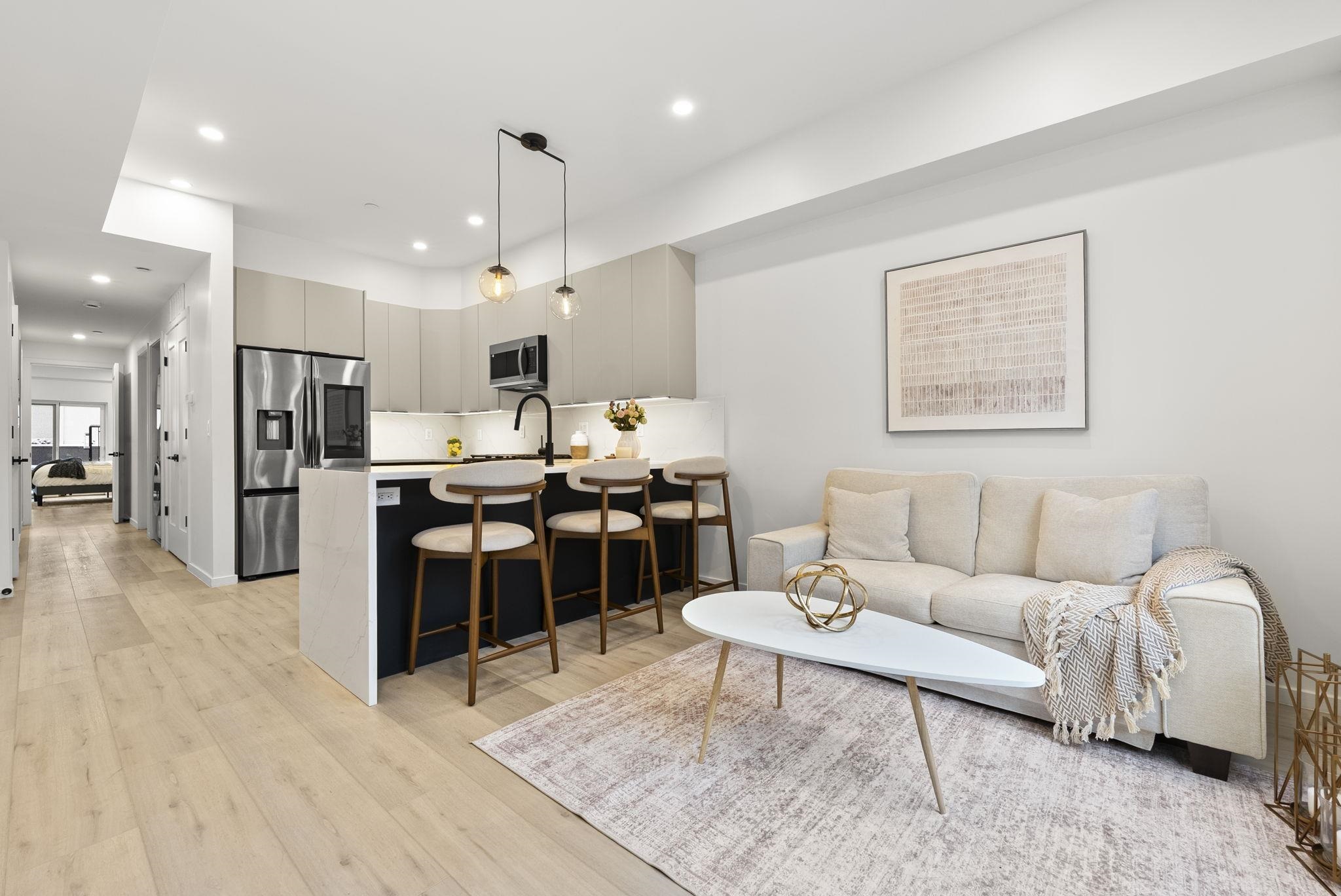 63 WEBSTER AVE Unit: 1