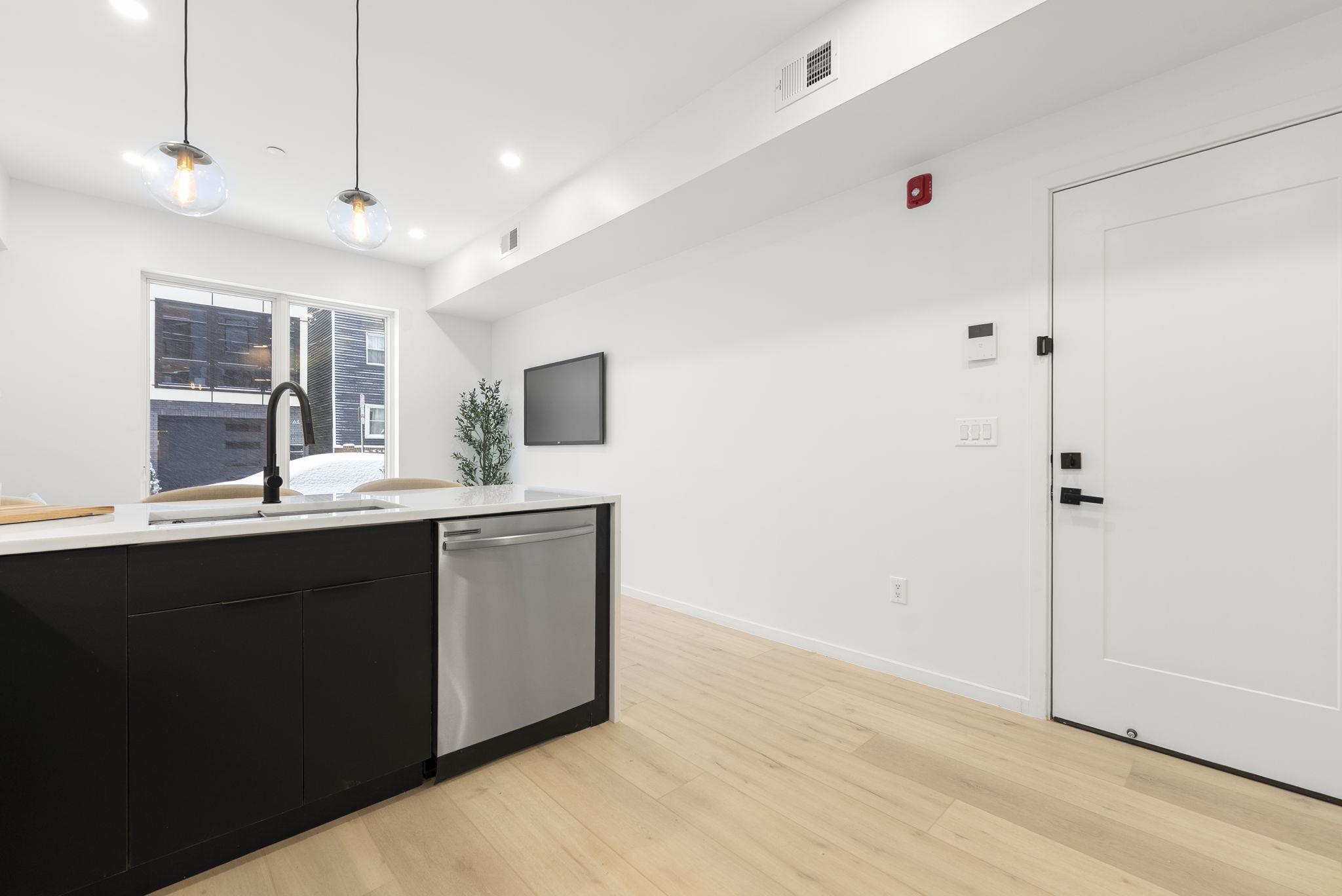 63 WEBSTER AVE Unit: 1