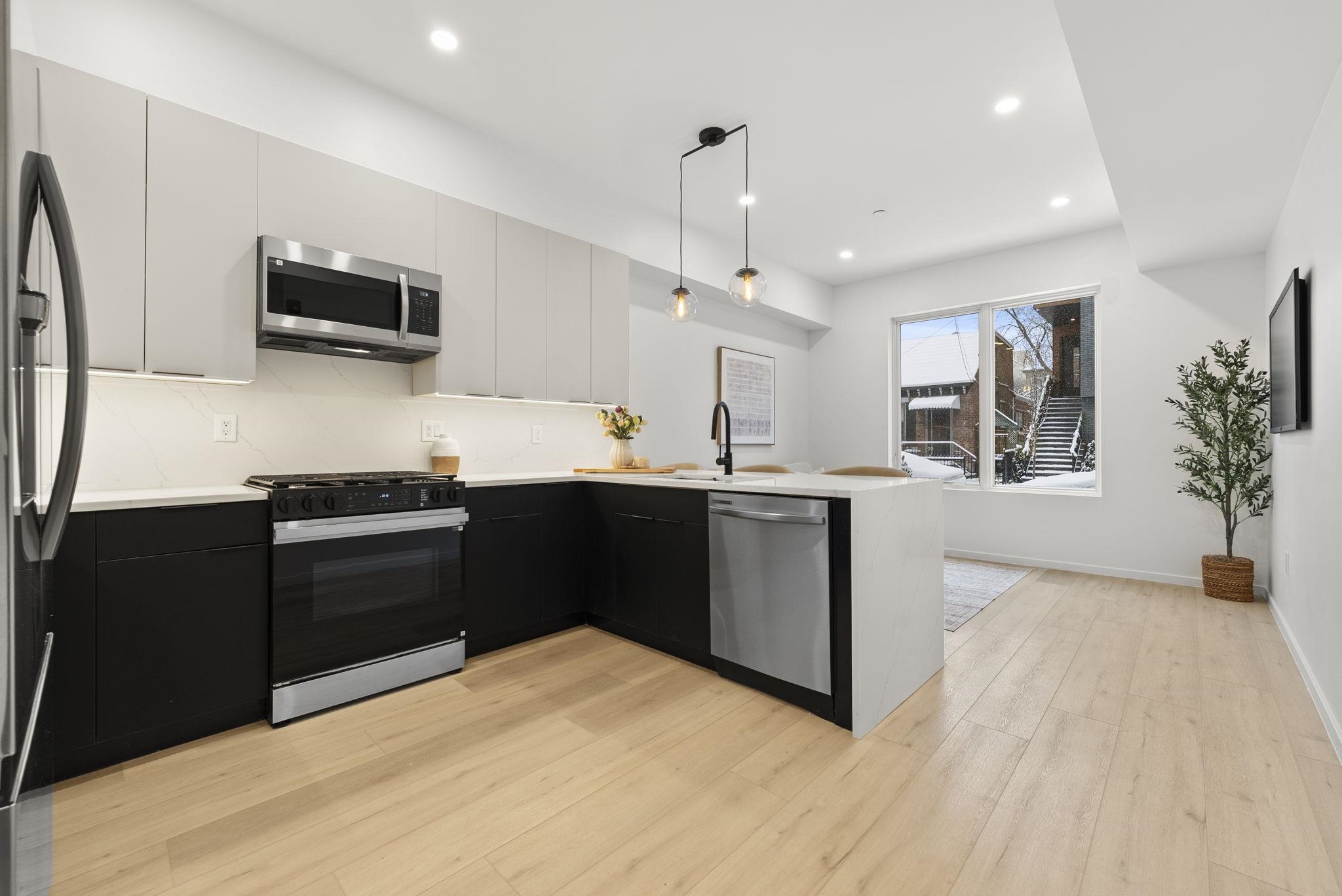 63 WEBSTER AVE Unit: 1