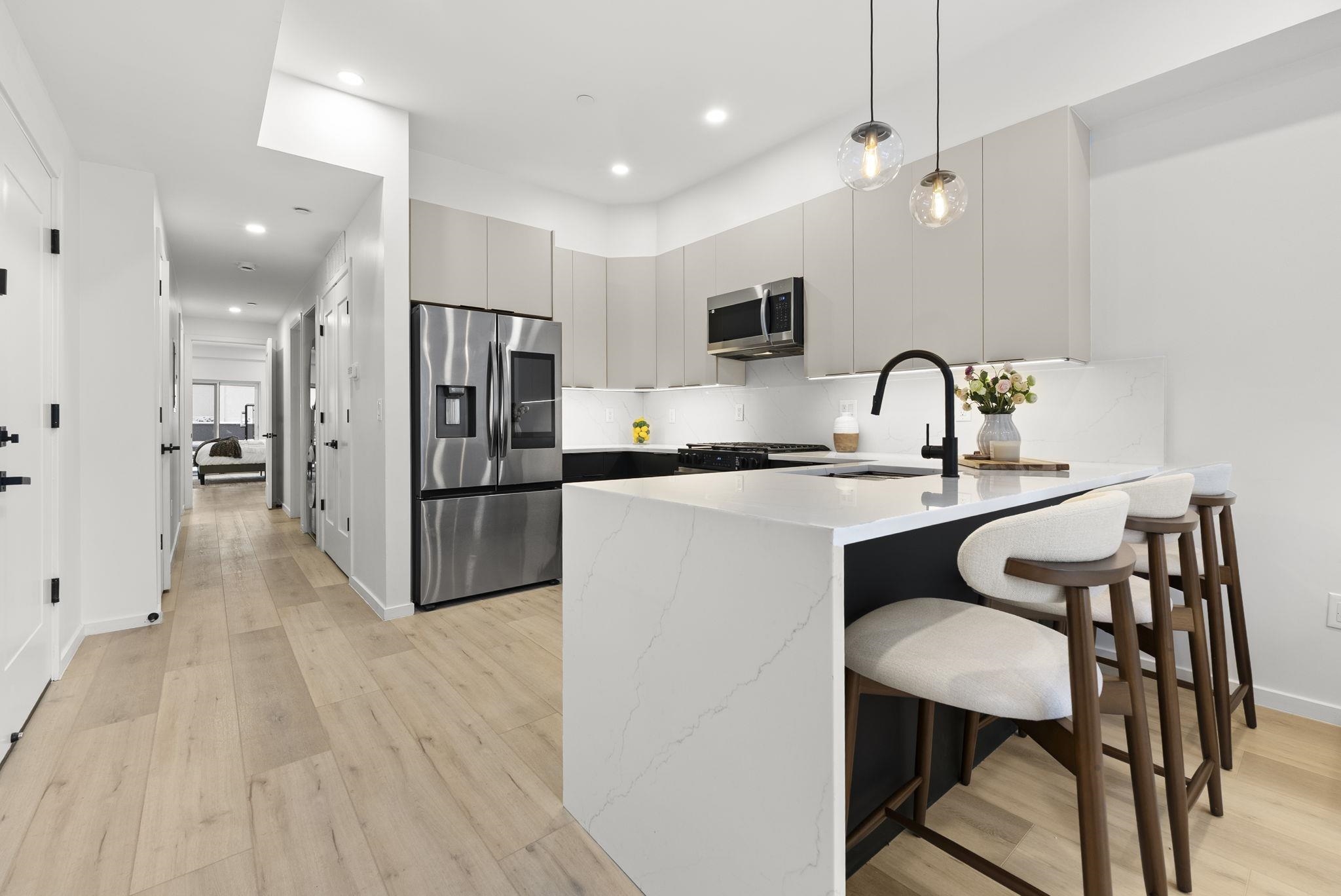 63 WEBSTER AVE Unit: 1