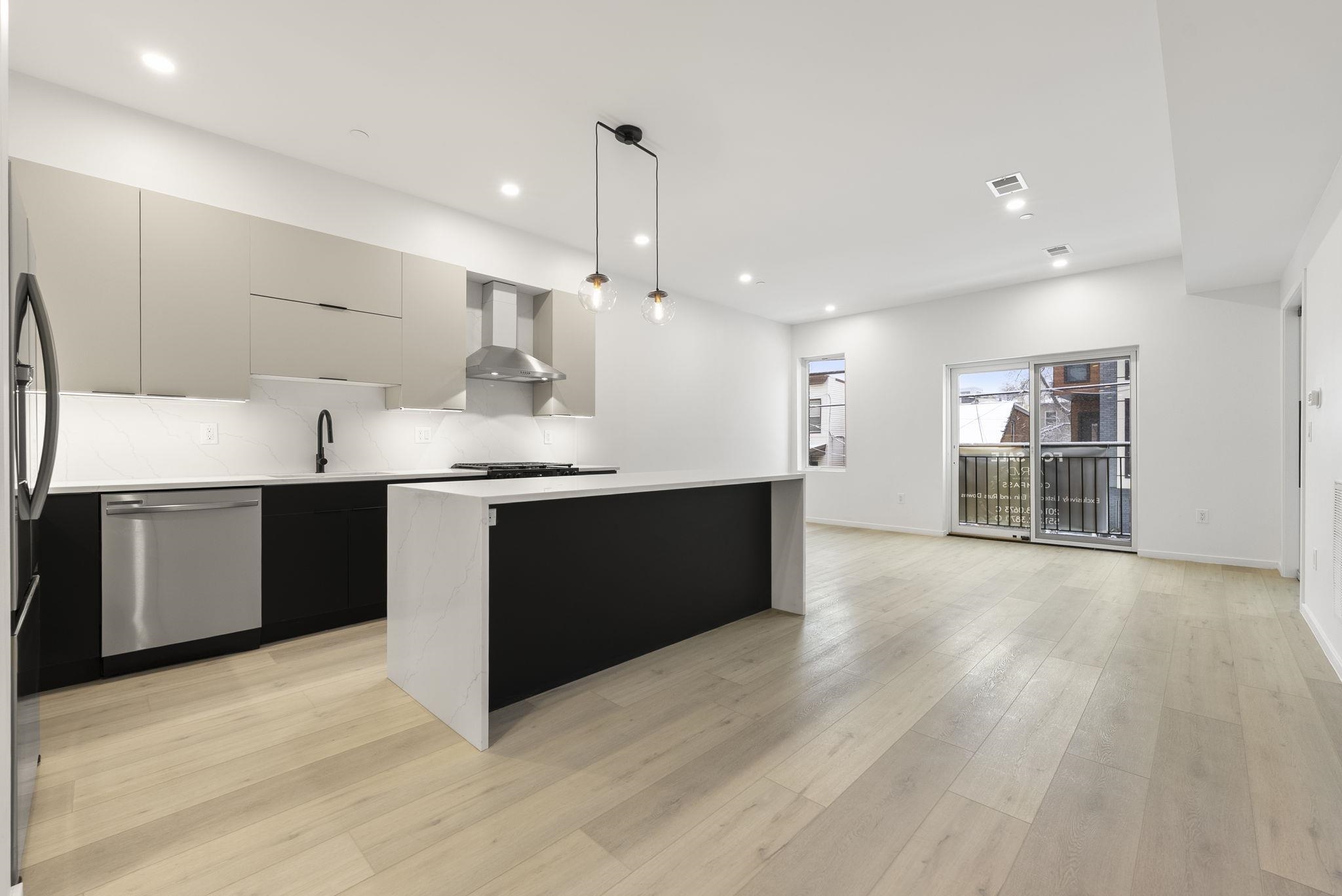 63 WEBSTER AVE Unit: 2