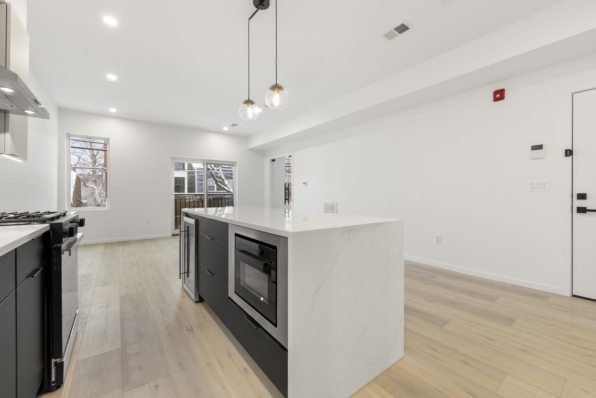 63 WEBSTER AVE Unit: 2