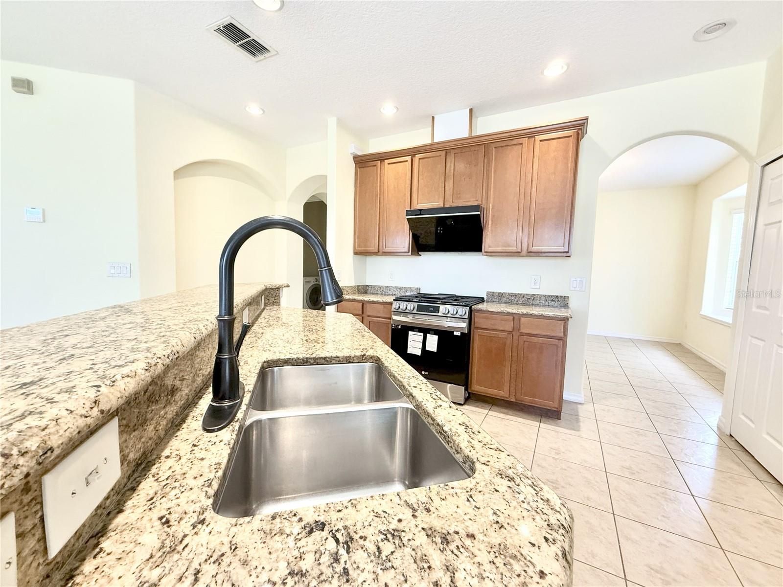 8737 LEELAND ARCHER BLVD