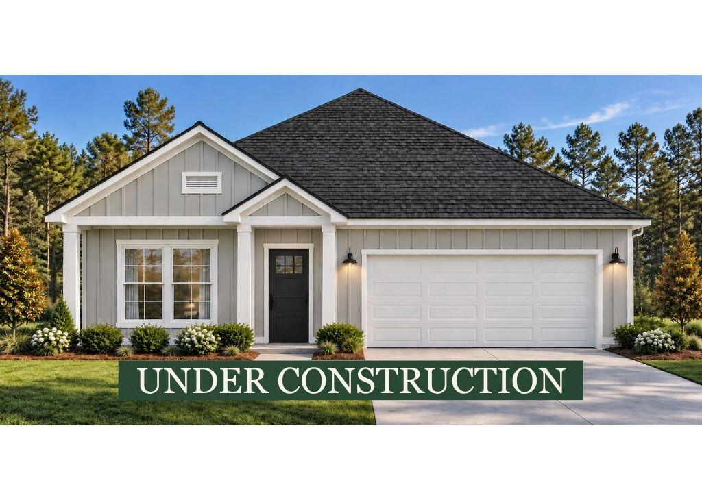 Gray single-story home with a two-car garage, labeled under construction.