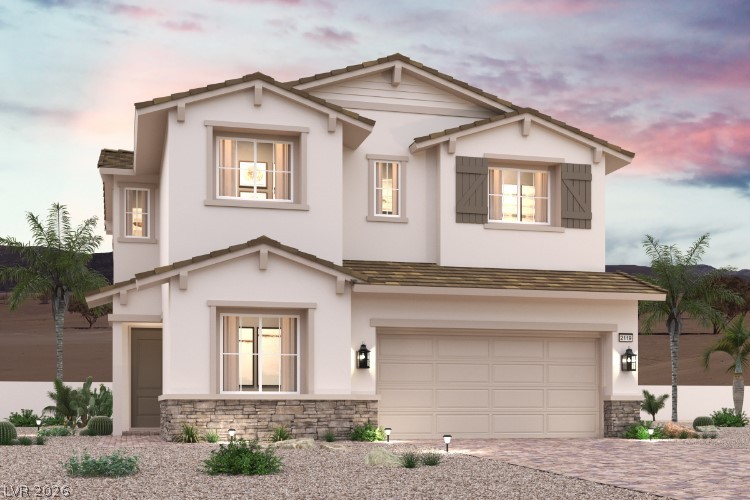 Two-story stucco home with a two-car garage, stone accents, and desert landscaping at dusk.