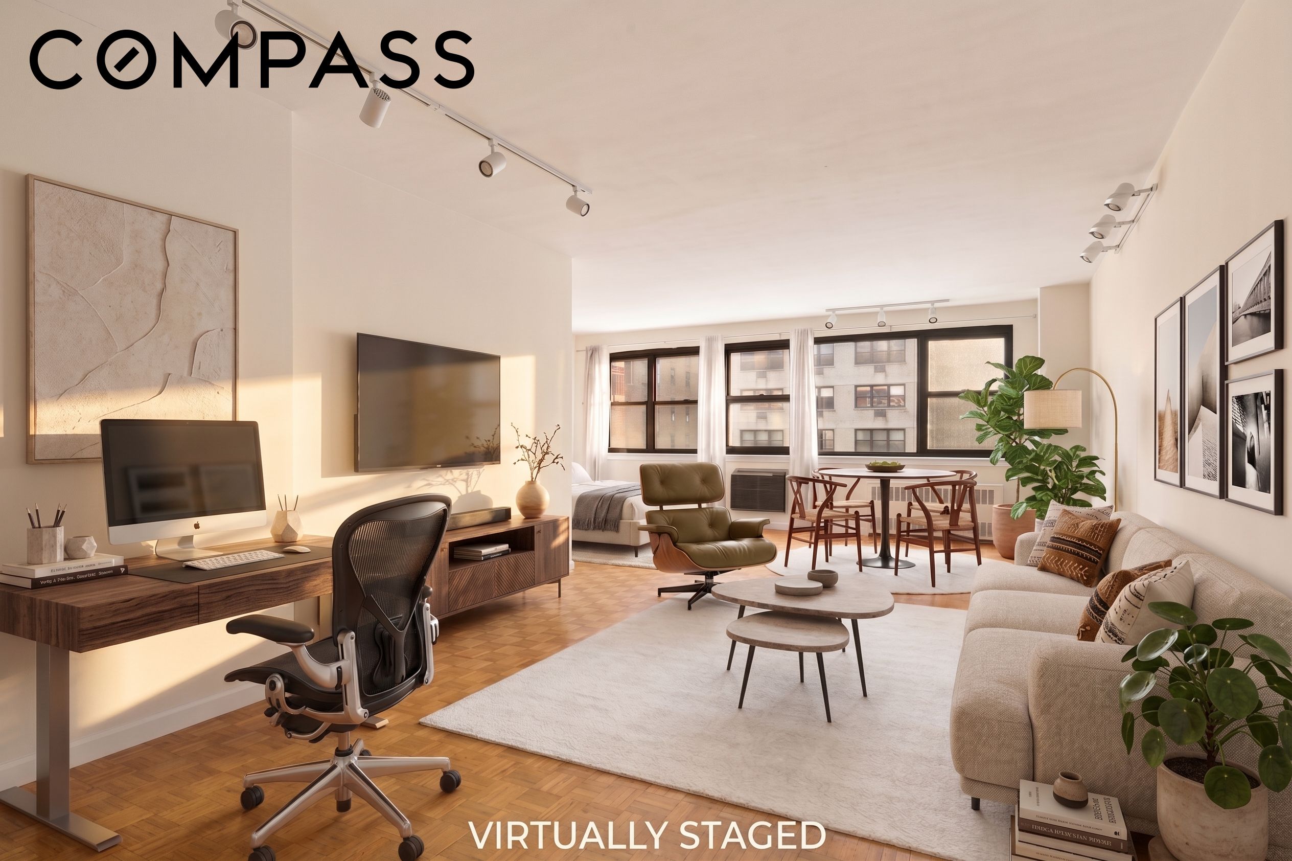 Virtually staged living room with parquet floors, a desk, cream sofa, and large windows.