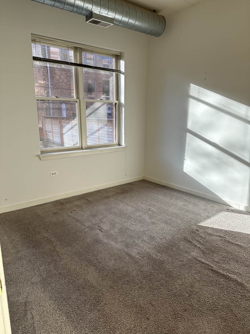 1155 W MADISON Avenue Unit: 210