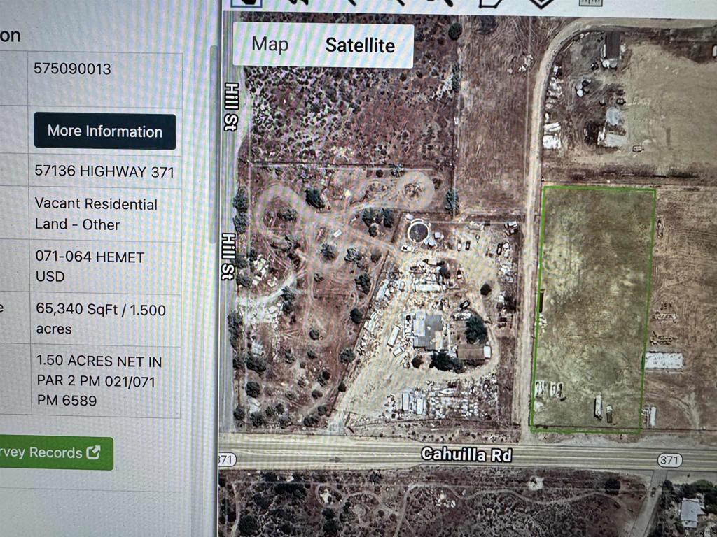 Vacant parcel outlined in green beside Cahuilla Road, shown in a satellite map listing screenshot.
