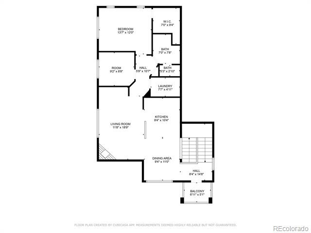 Floor plan showing the unit’s bedroom, two bathrooms, living room, kitchen, dining area, laundry, and balcony.