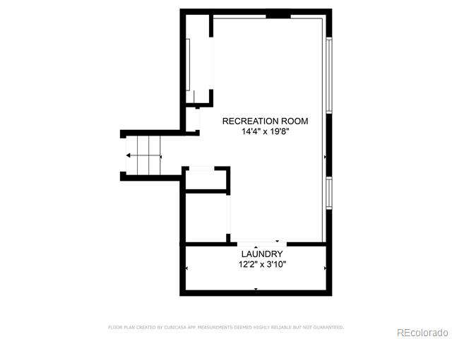 Floor plan with a recreation room, laundry area, and staircase.