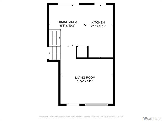 Floor plan showing the dining area, kitchen, living room, and stairs.