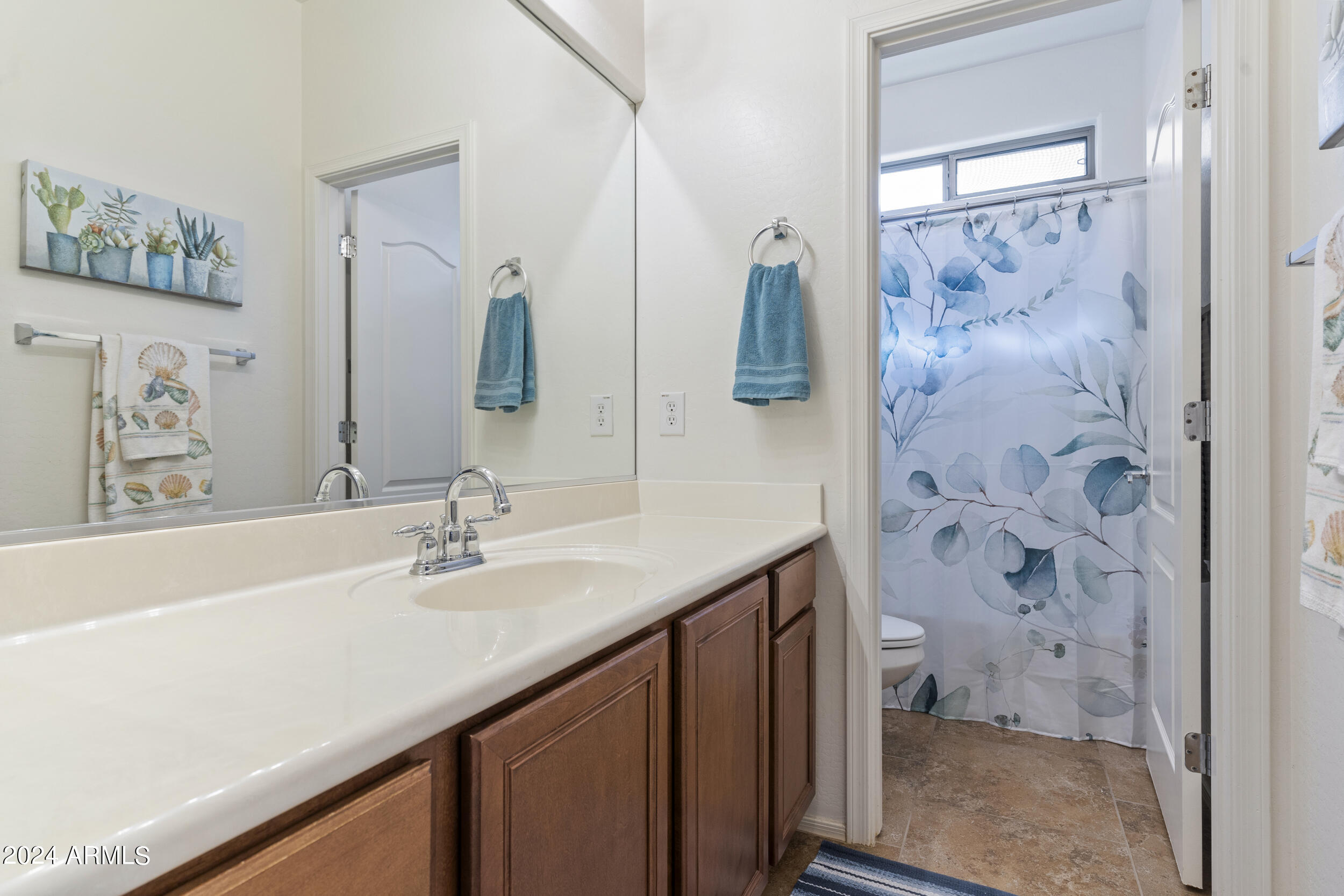 10864 E REGINALD Avenue