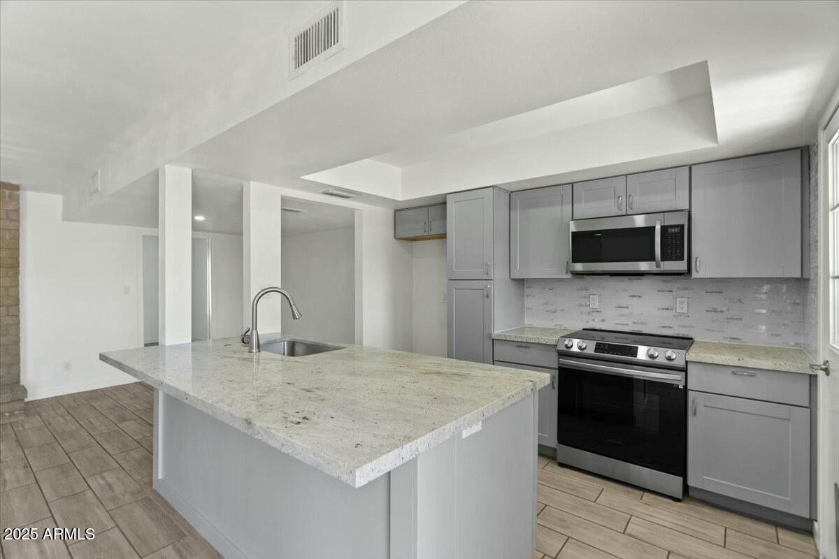 3223 W PURDUE Avenue