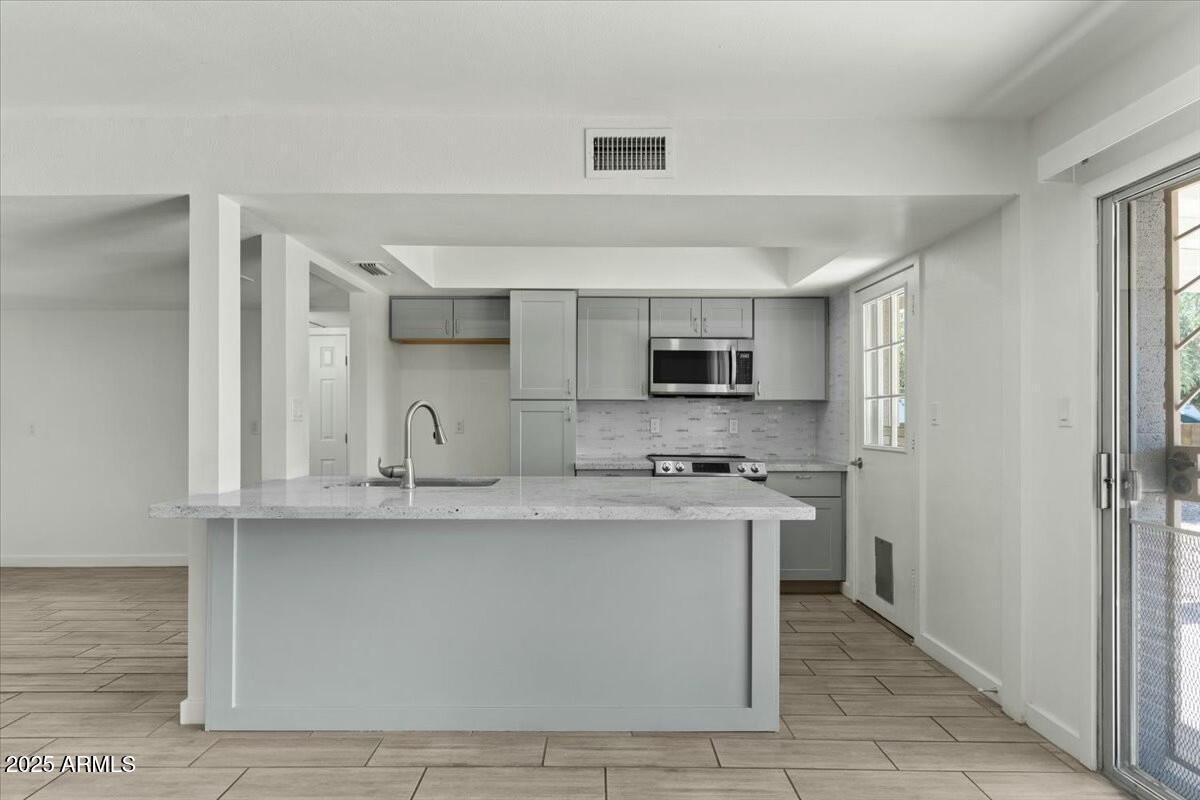 3223 W PURDUE Avenue