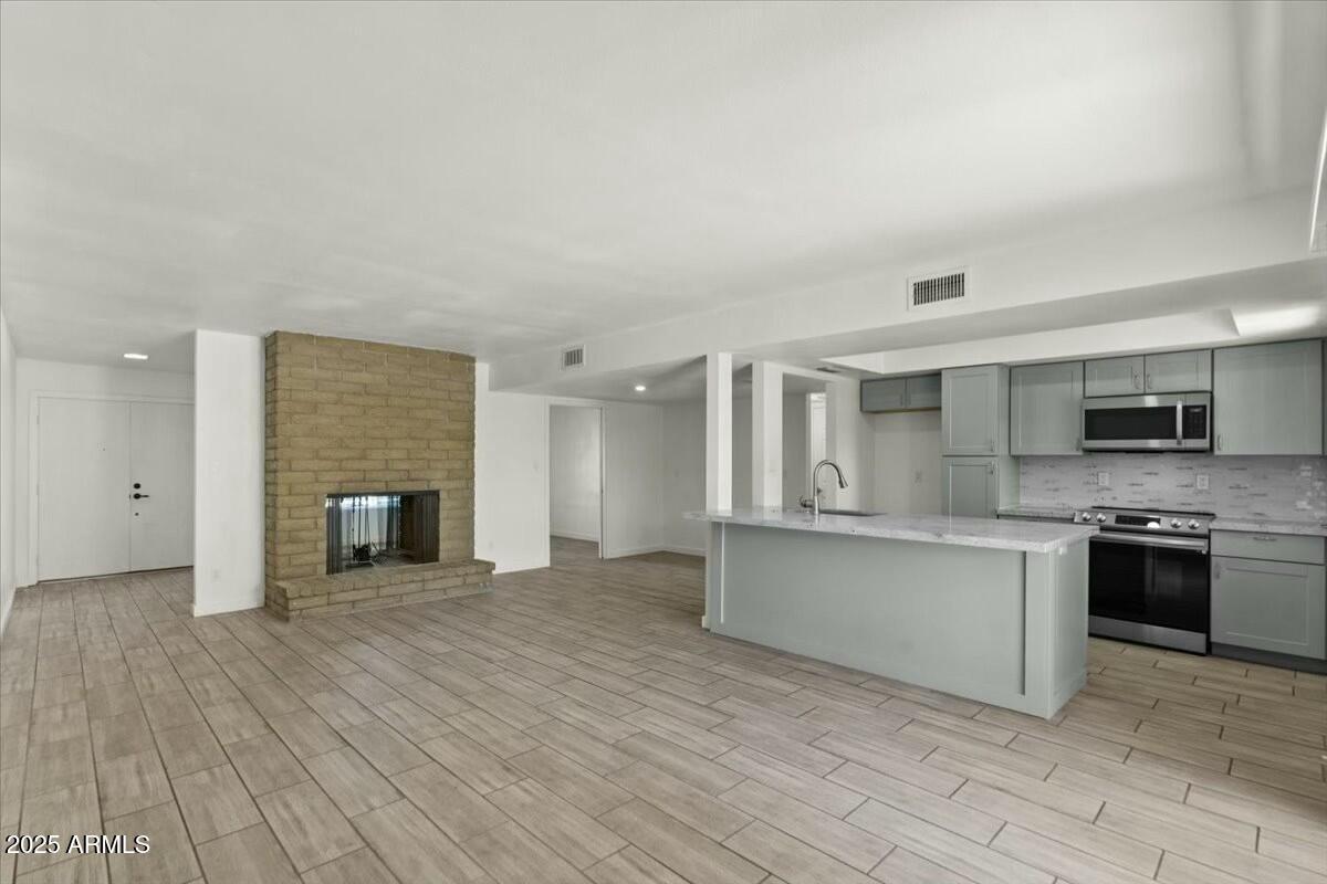 3223 W PURDUE Avenue