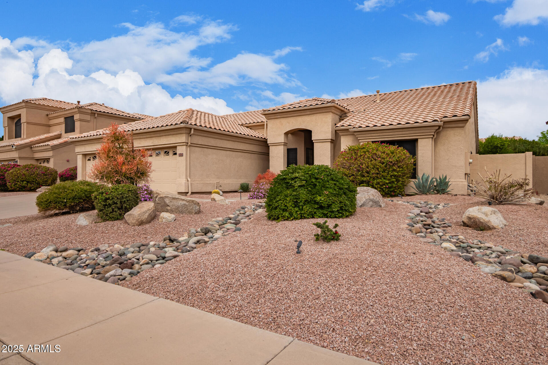 9104 E HILLERY Drive