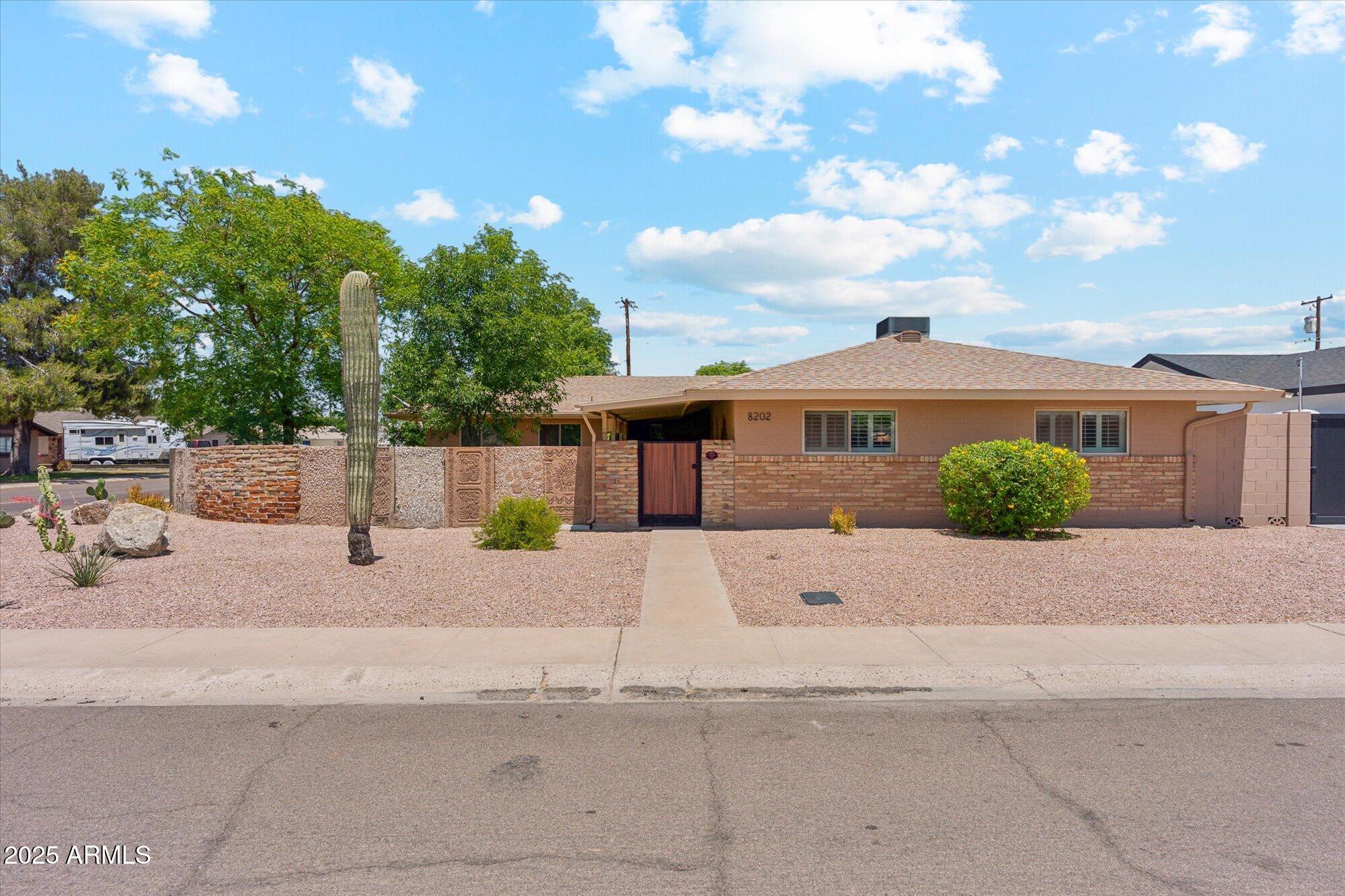 8202 E COOLIDGE Street