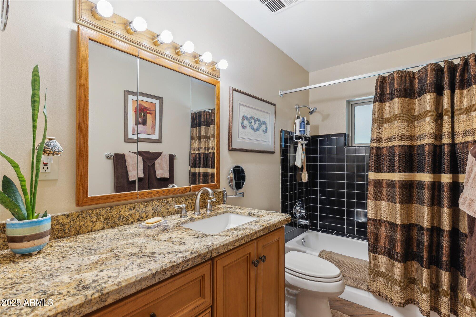 8202 E COOLIDGE Street