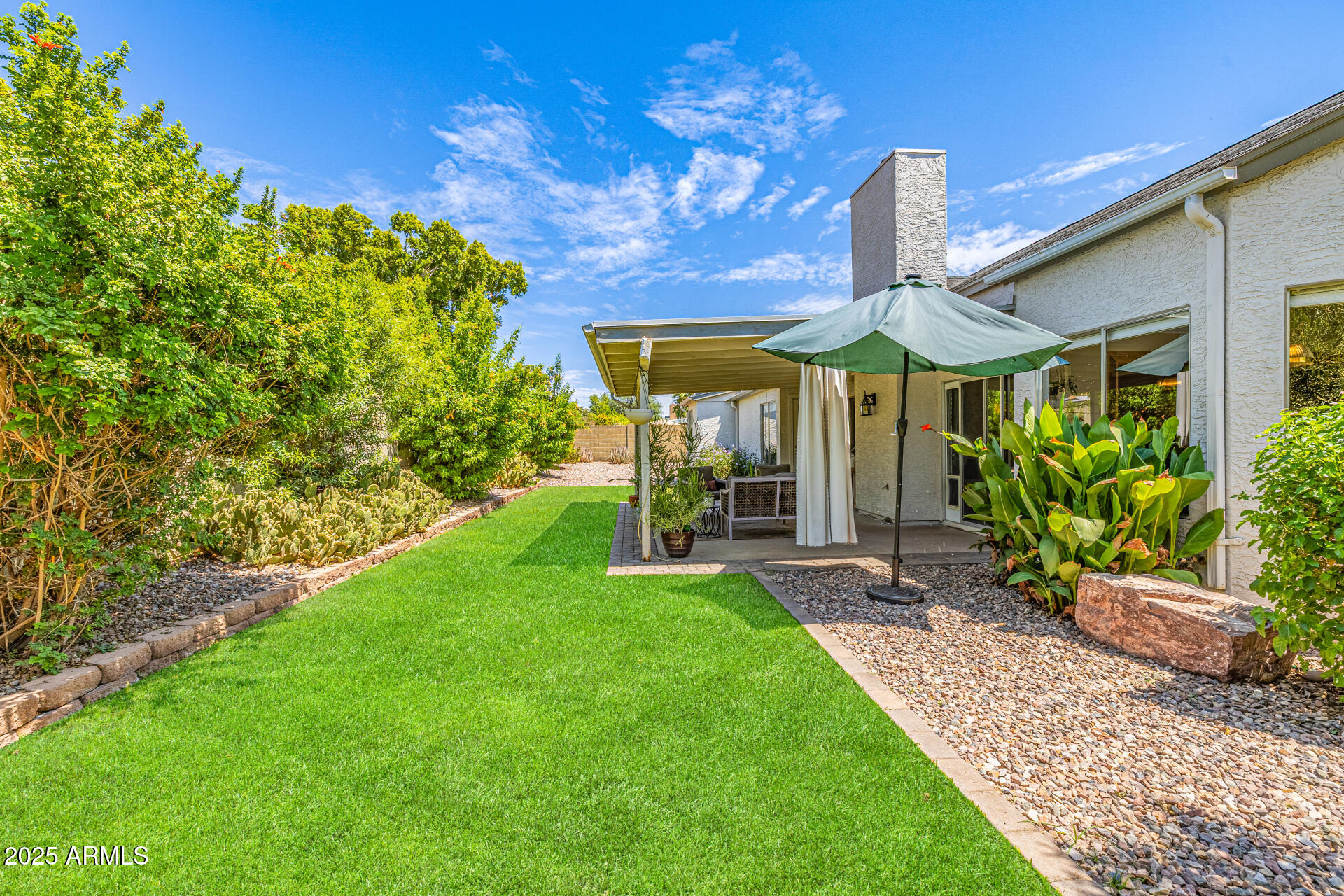 6636 E IVYGLEN Street