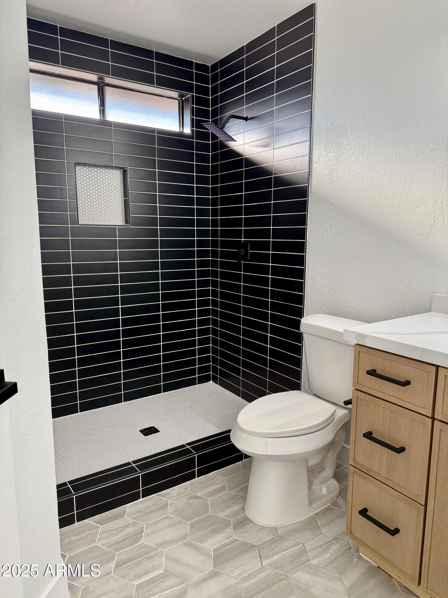 8665 E BELLEVIEW Place