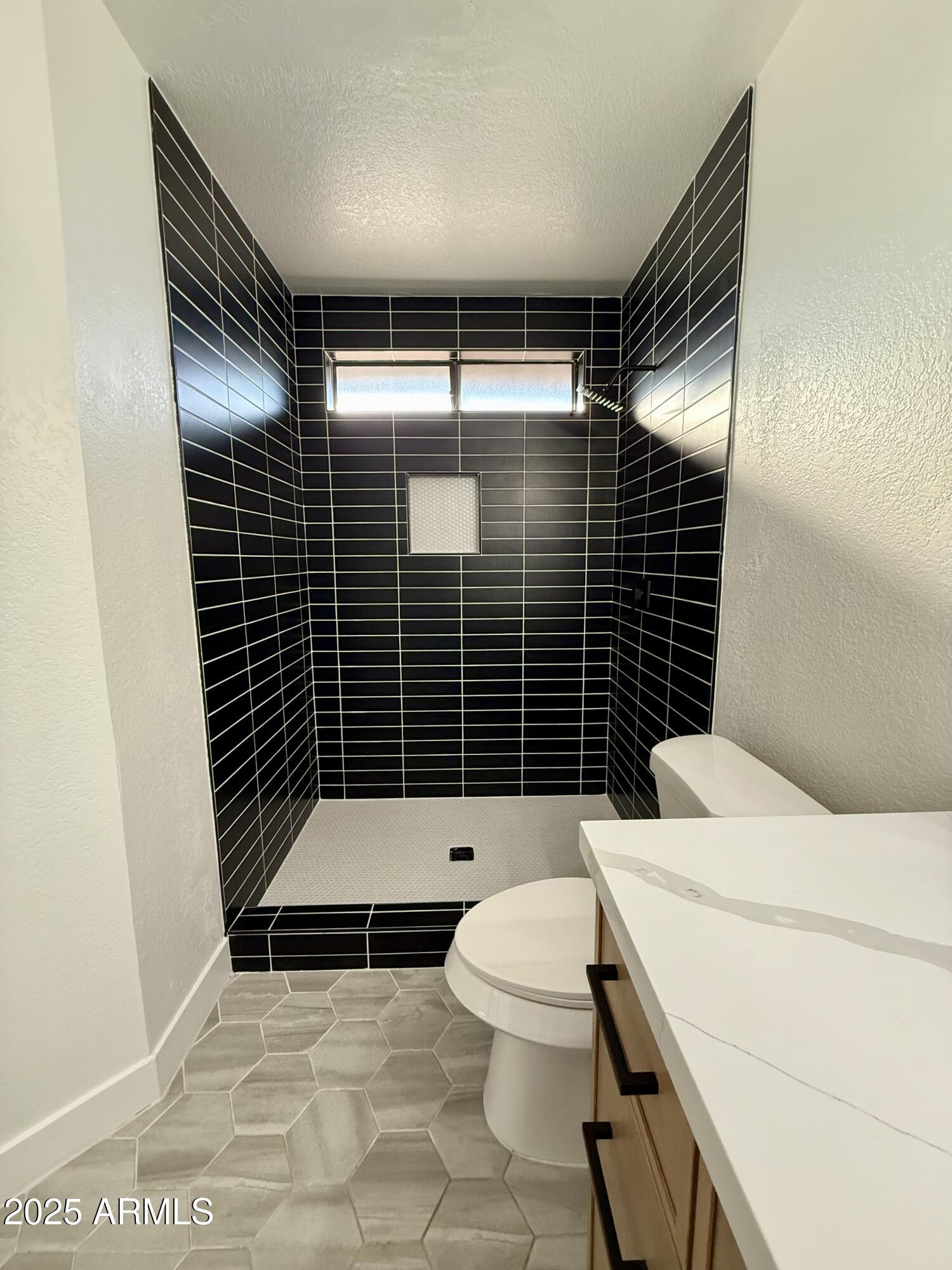 8665 E BELLEVIEW Place