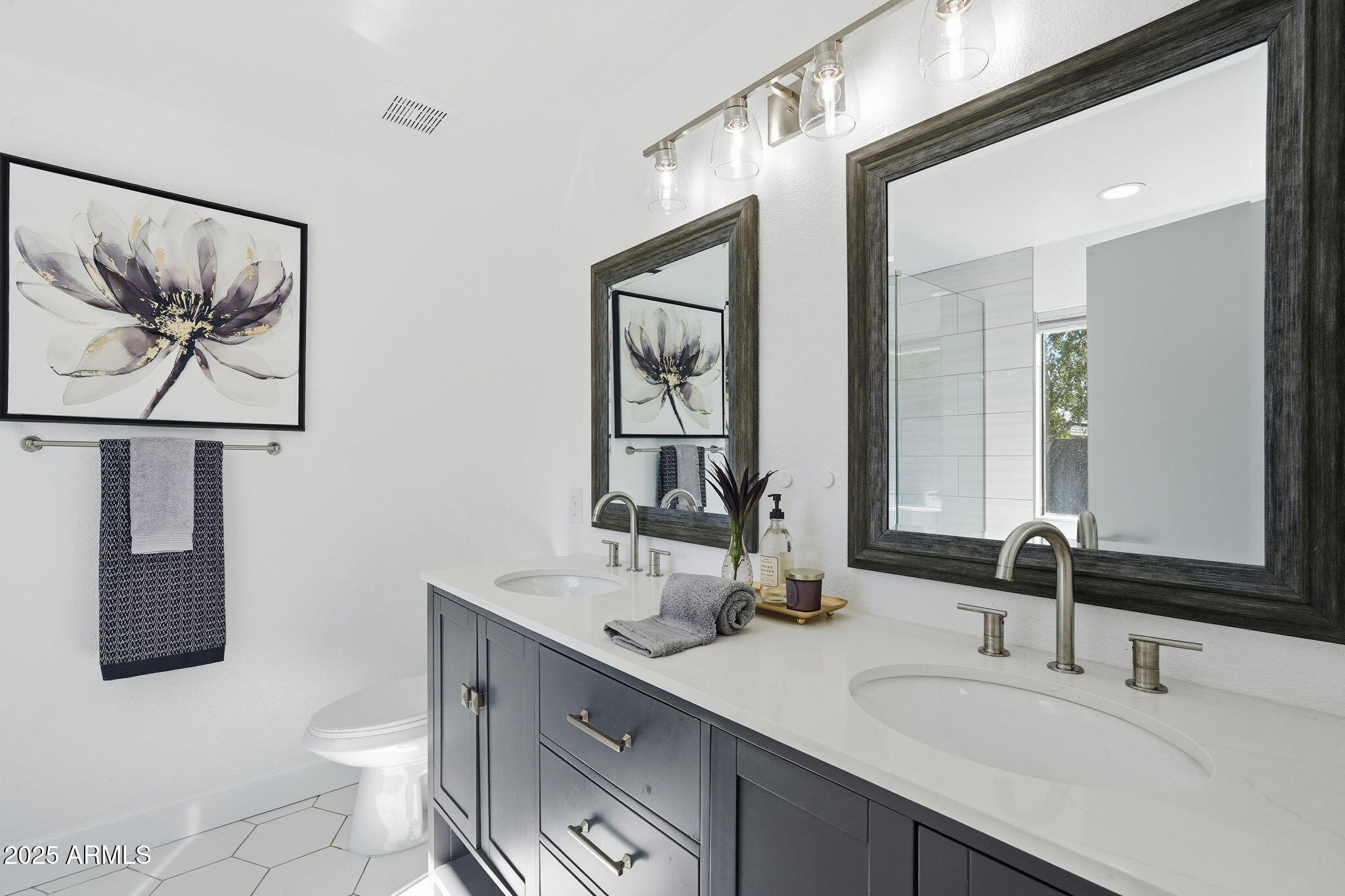 3301 E HONONEGH Drive