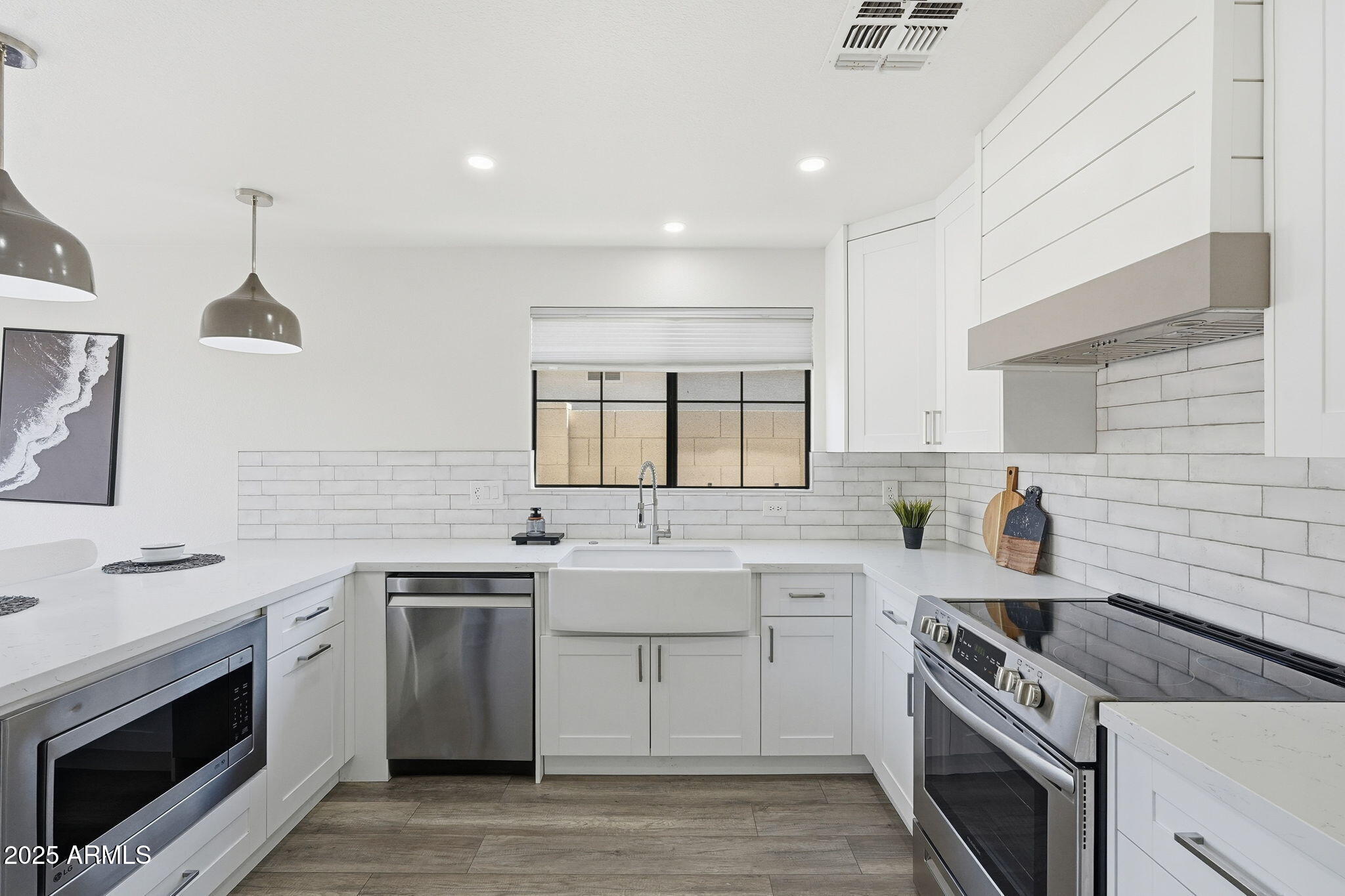 3301 E HONONEGH Drive