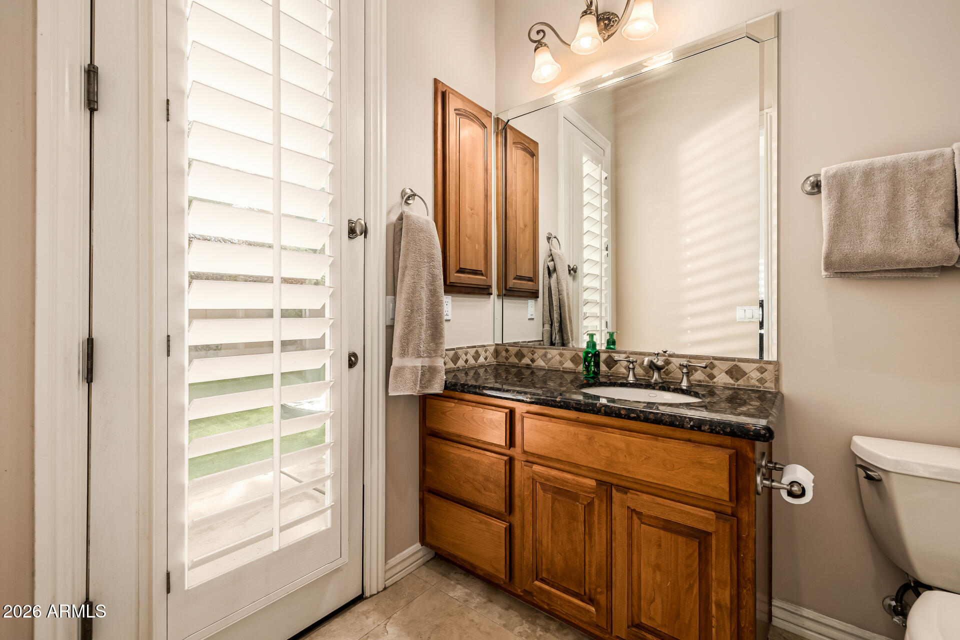 6135 W TROVITA Place