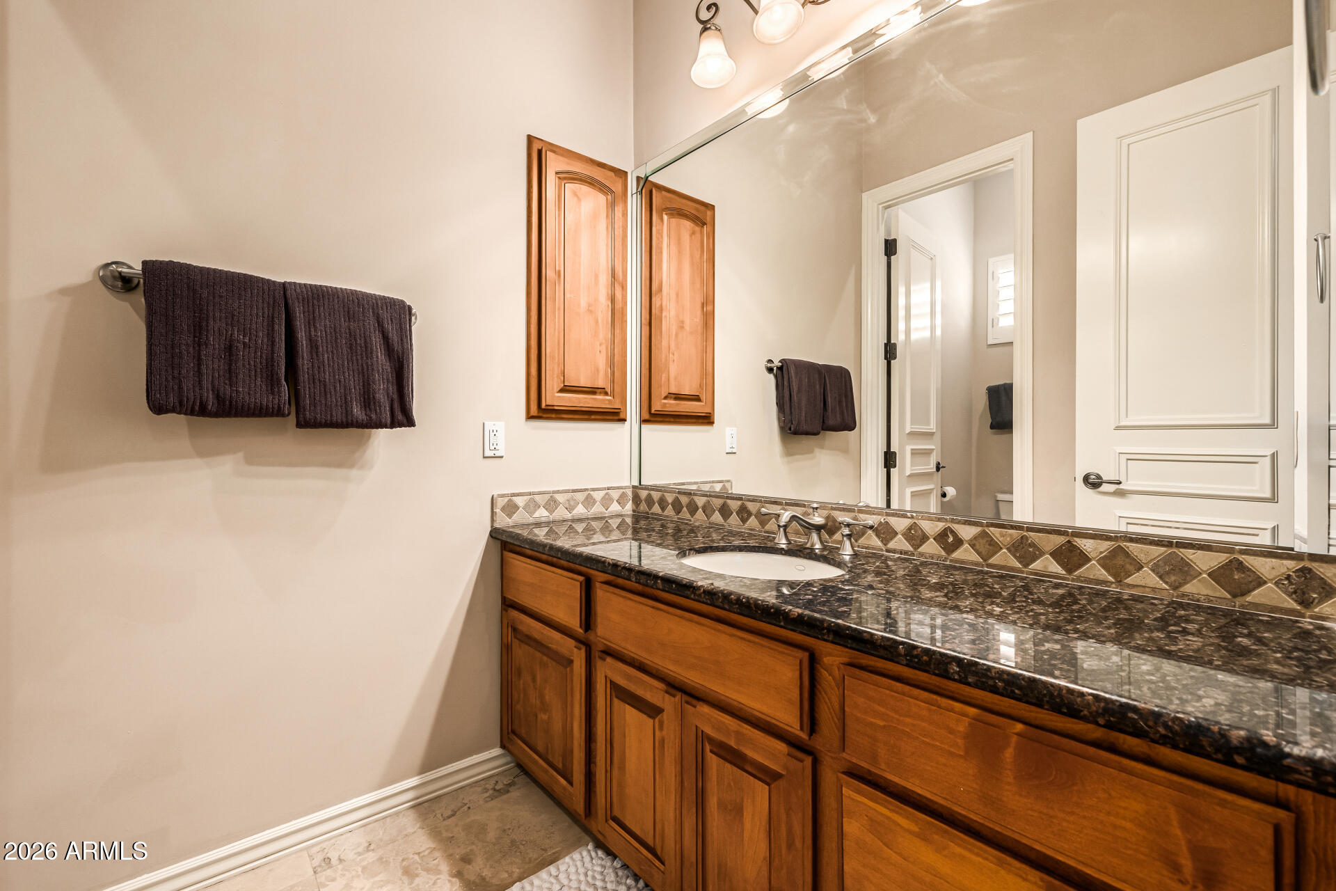 6135 W TROVITA Place