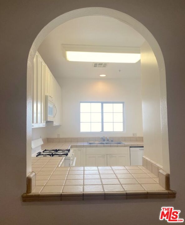 Beautifully maintained with arched windows