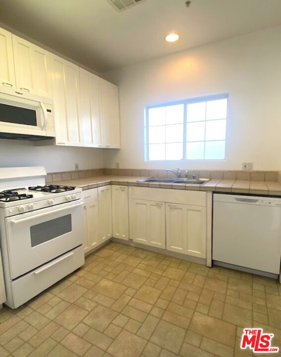 Beautifully maintained with arched windows