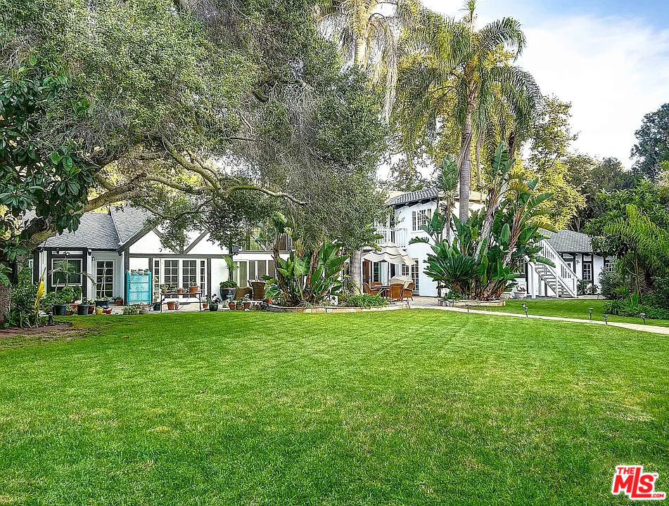 Set on nearly two flat, park-like acres