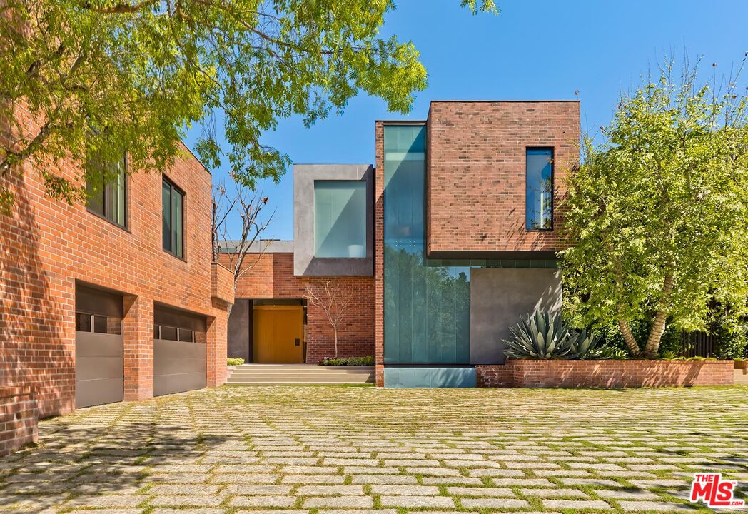 Located in the guard-gated Stoneridge Estates